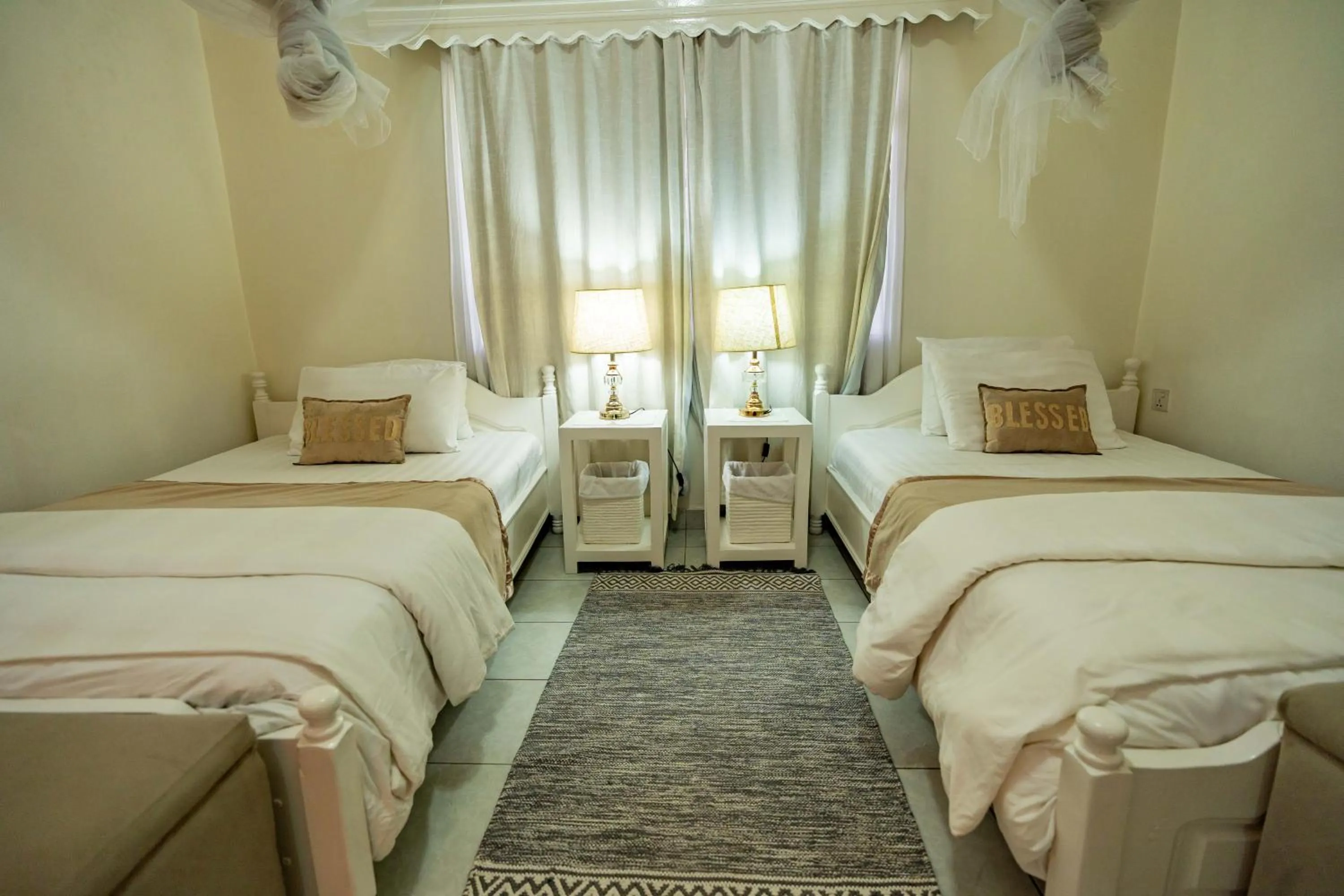 Bed in Blue Veil Villa Hotel