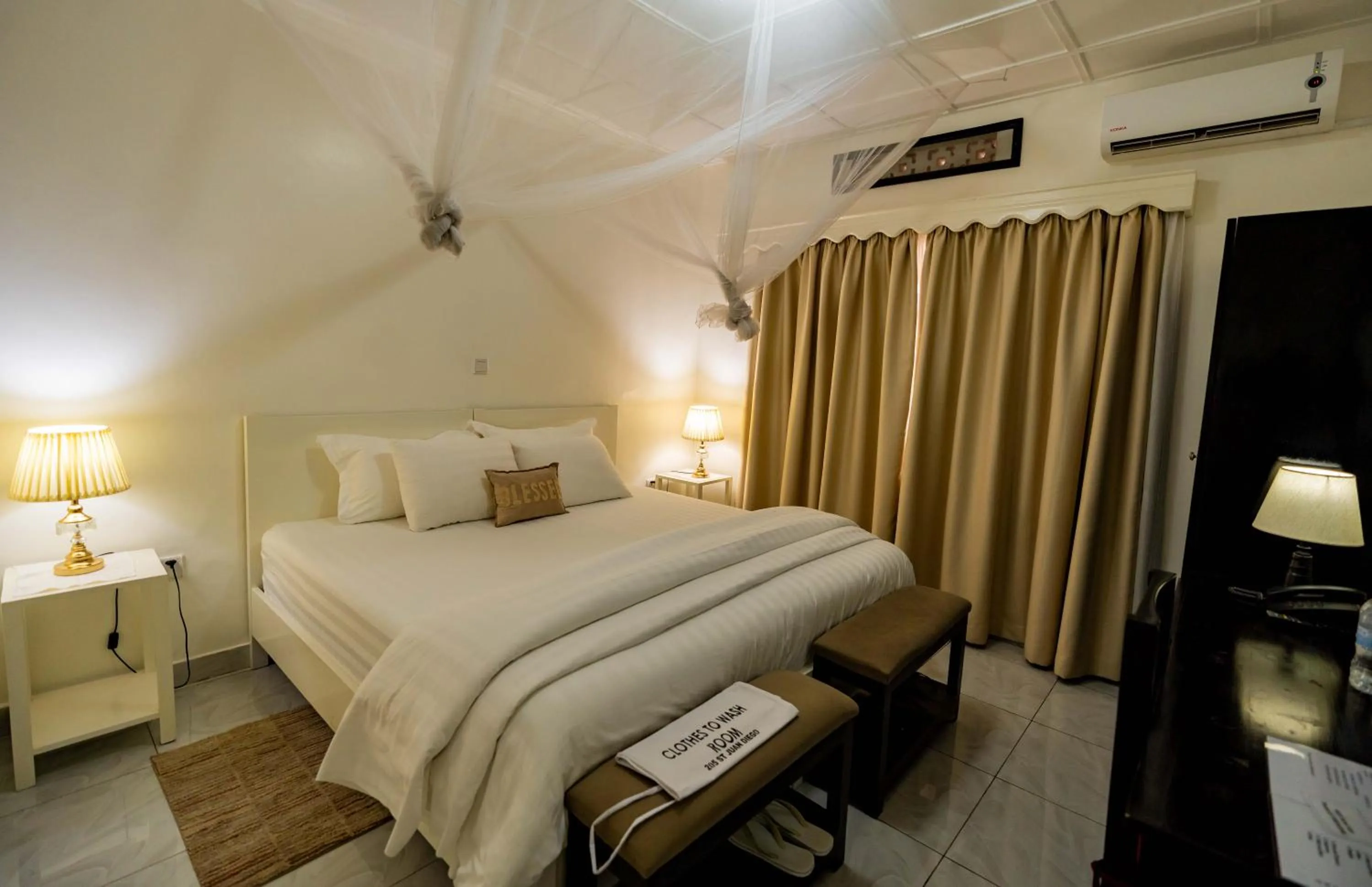 Bed in Blue Veil Villa Hotel