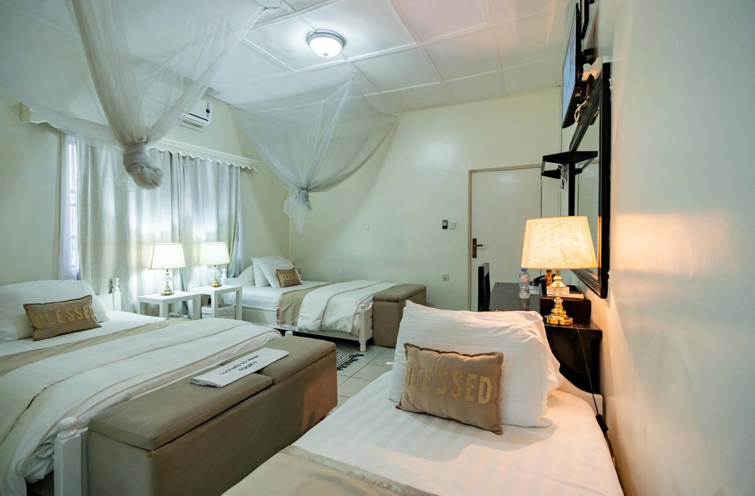 Bed in Blue Veil Villa Hotel