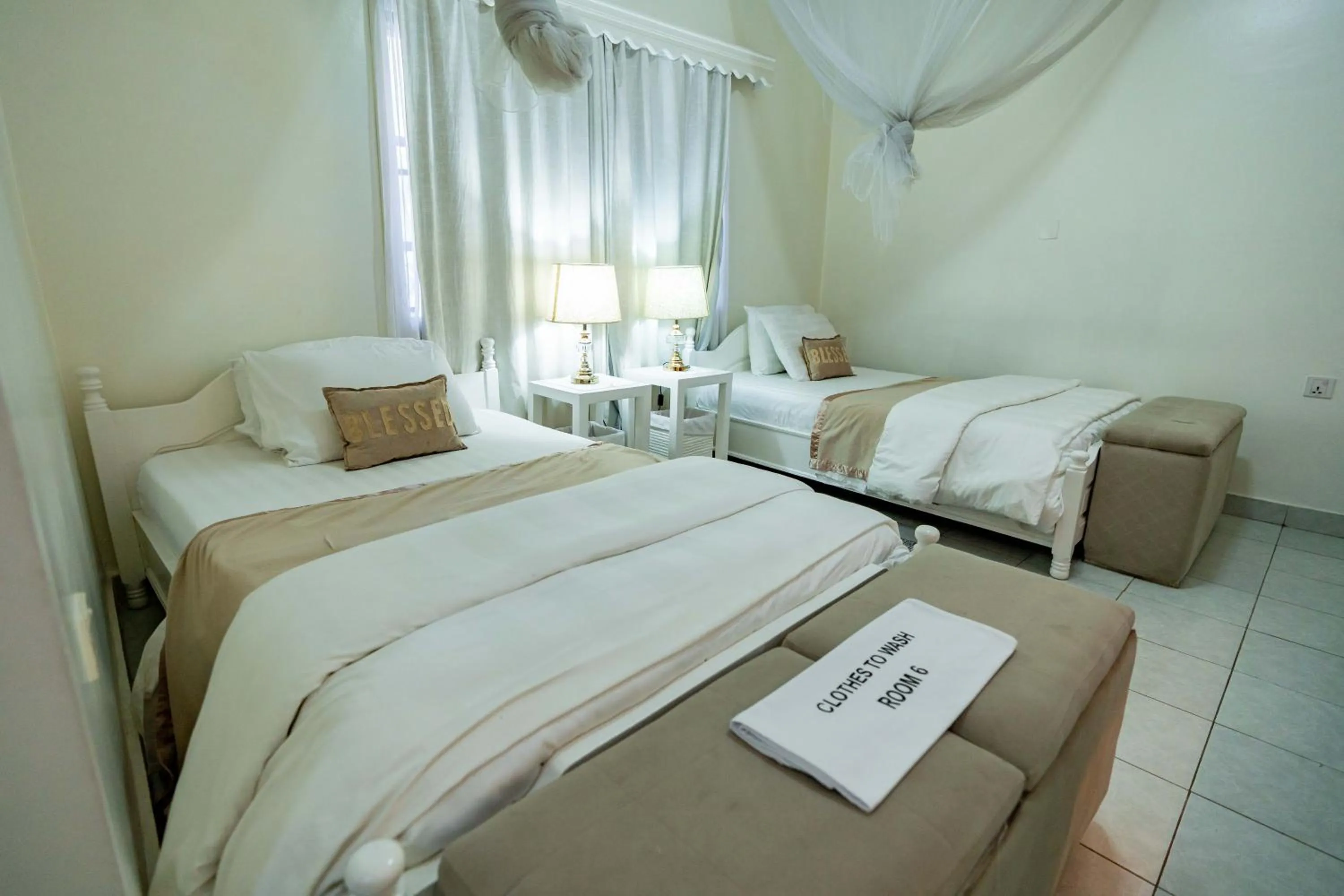 Bed in Blue Veil Villa Hotel