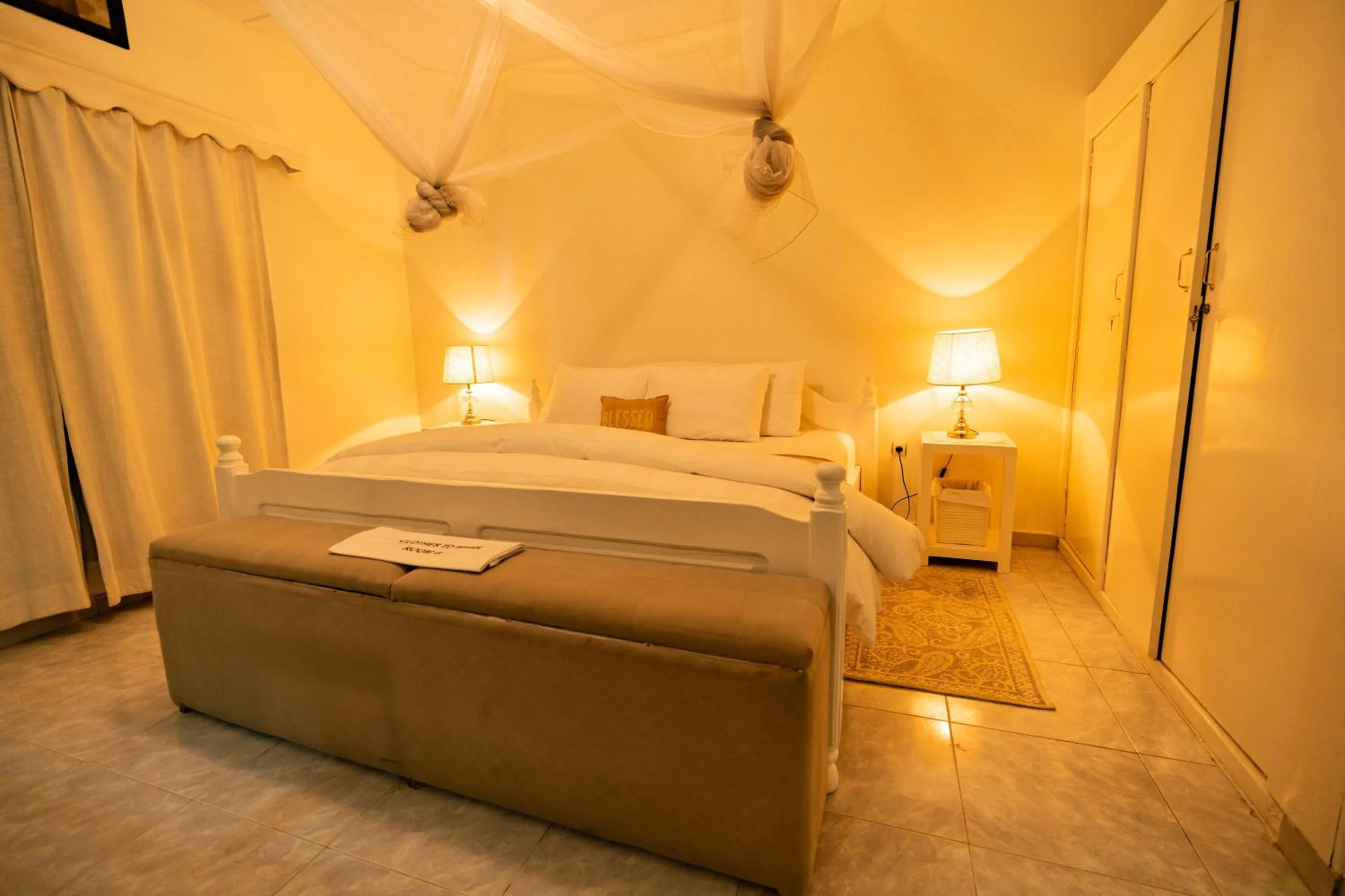 Bed in Blue Veil Villa Hotel