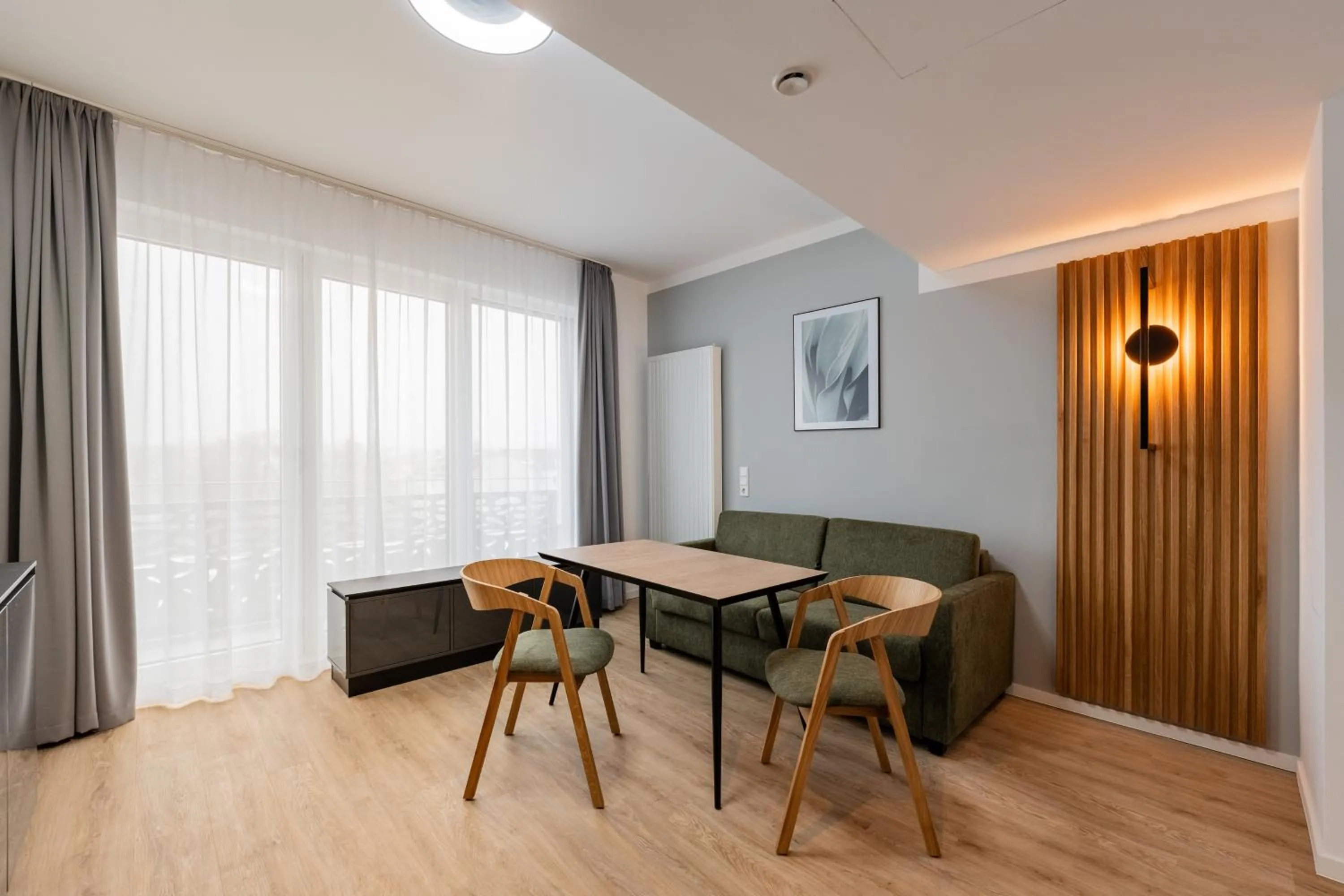 Seating area in Nena Apartments Berlin Adlershof