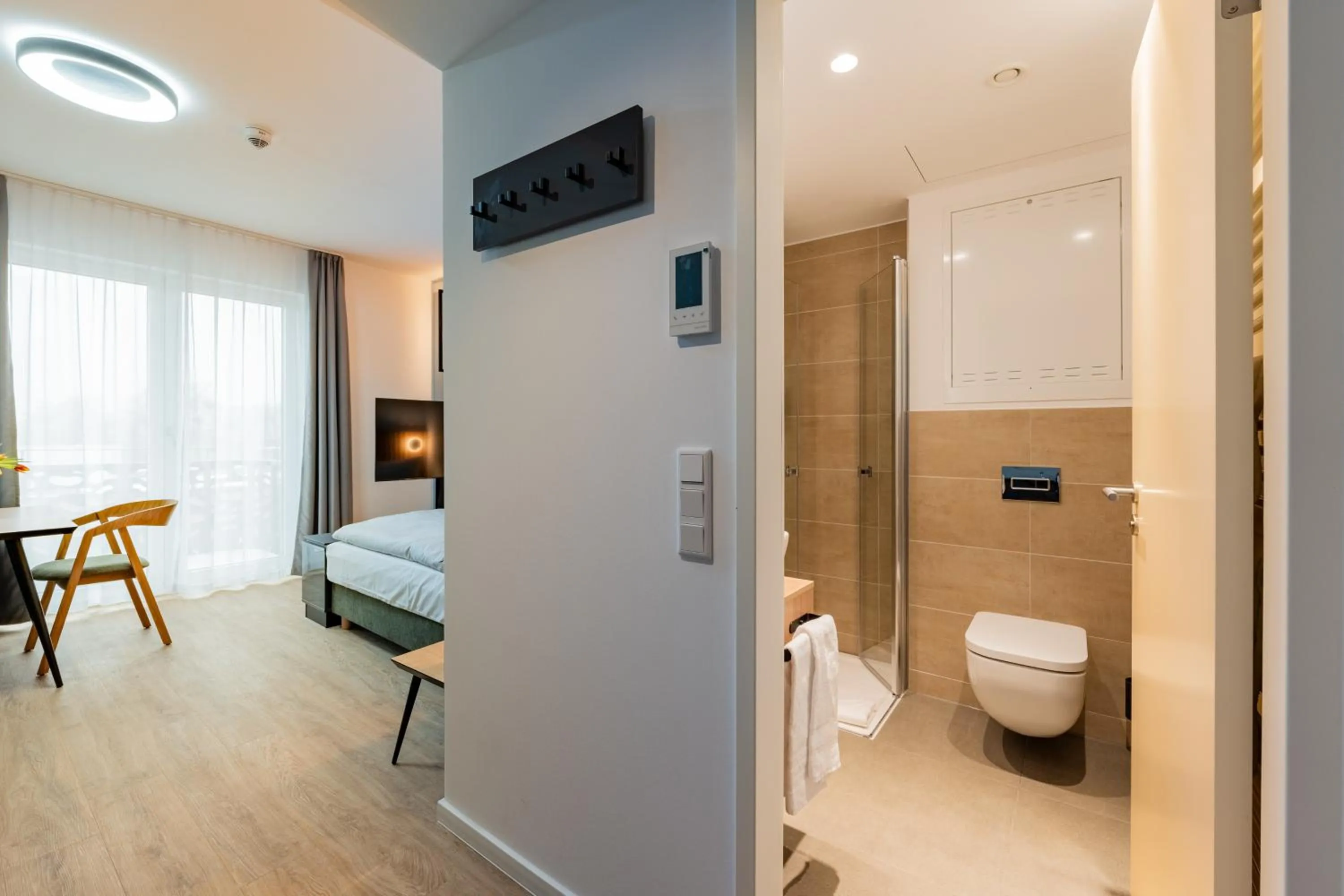 Photo of the whole room in Nena Apartments Berlin Adlershof