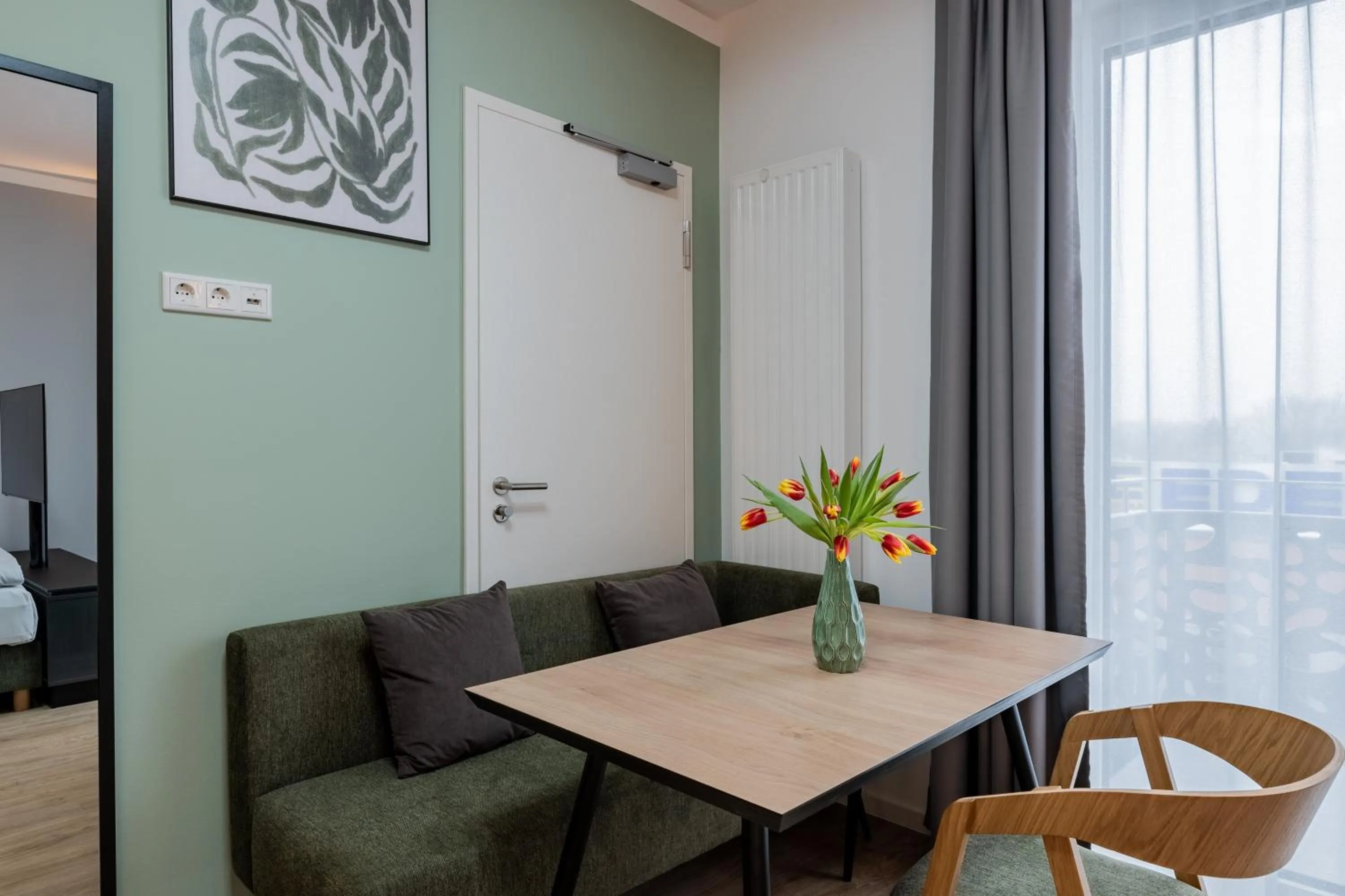 Seating area in Nena Apartments Berlin Adlershof