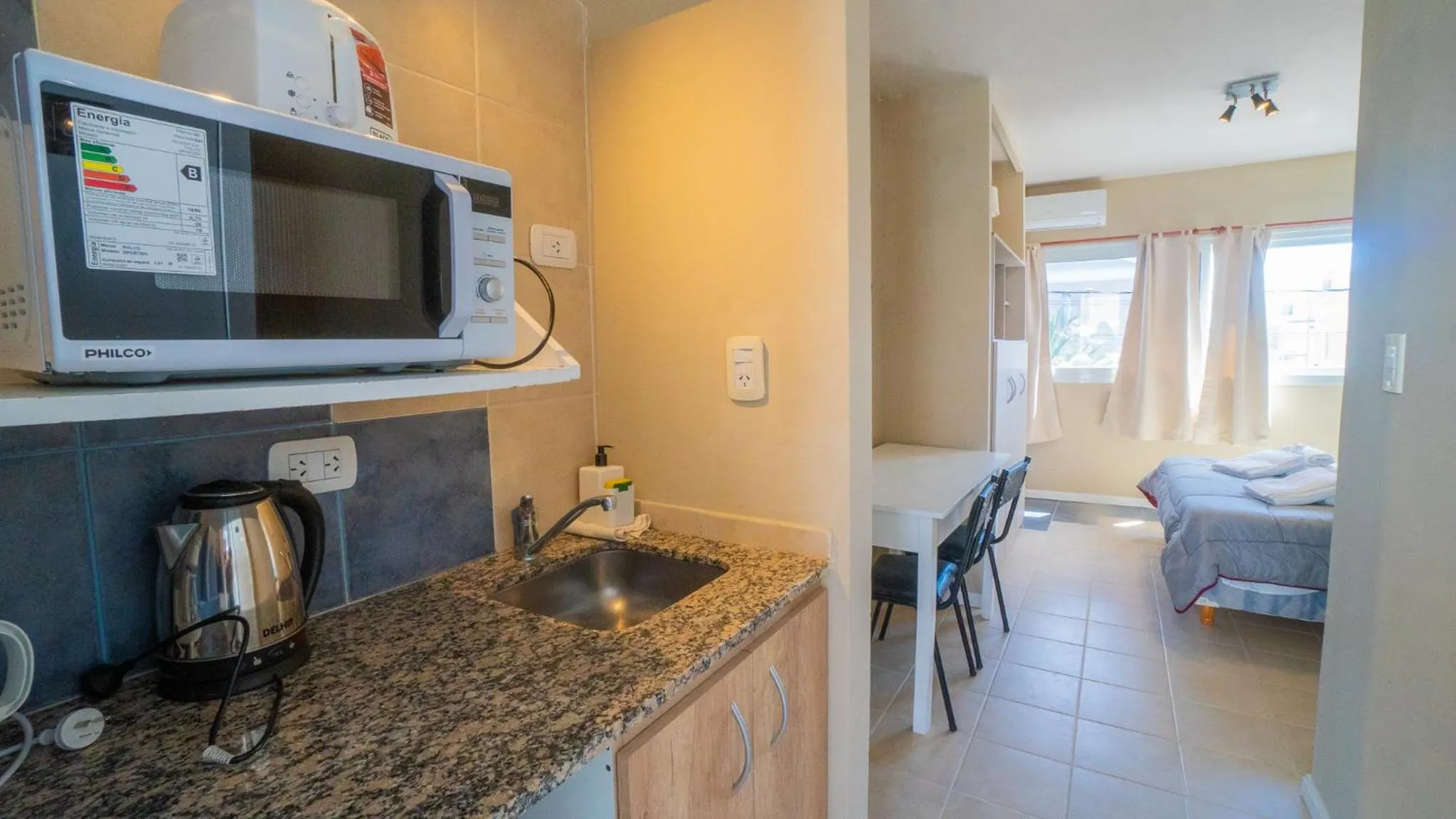 Kitchen or kitchenette, Bed in Apart del Golfo