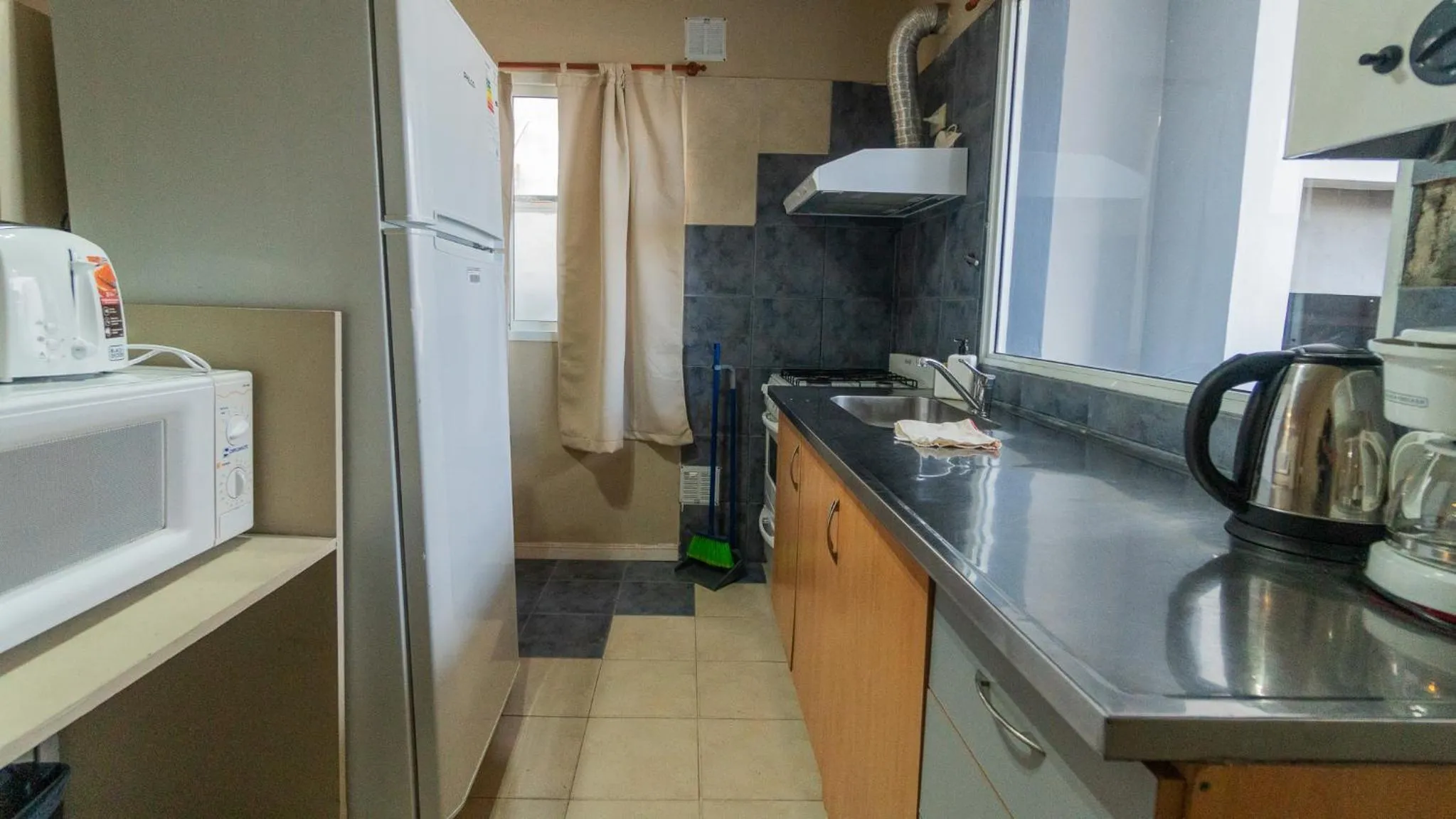 Kitchen or kitchenette in Apart del Golfo