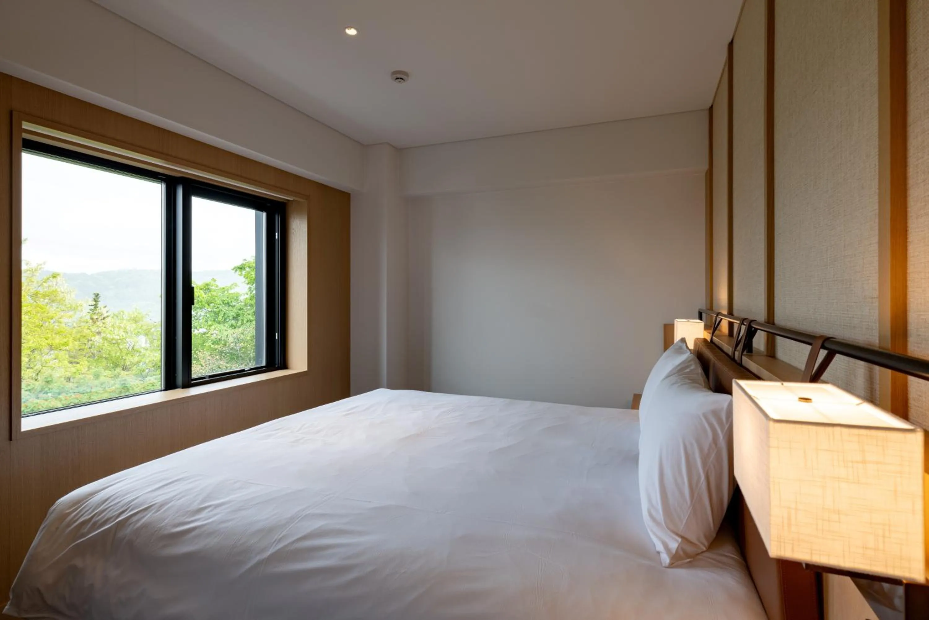 Bed in Nozo Hotel