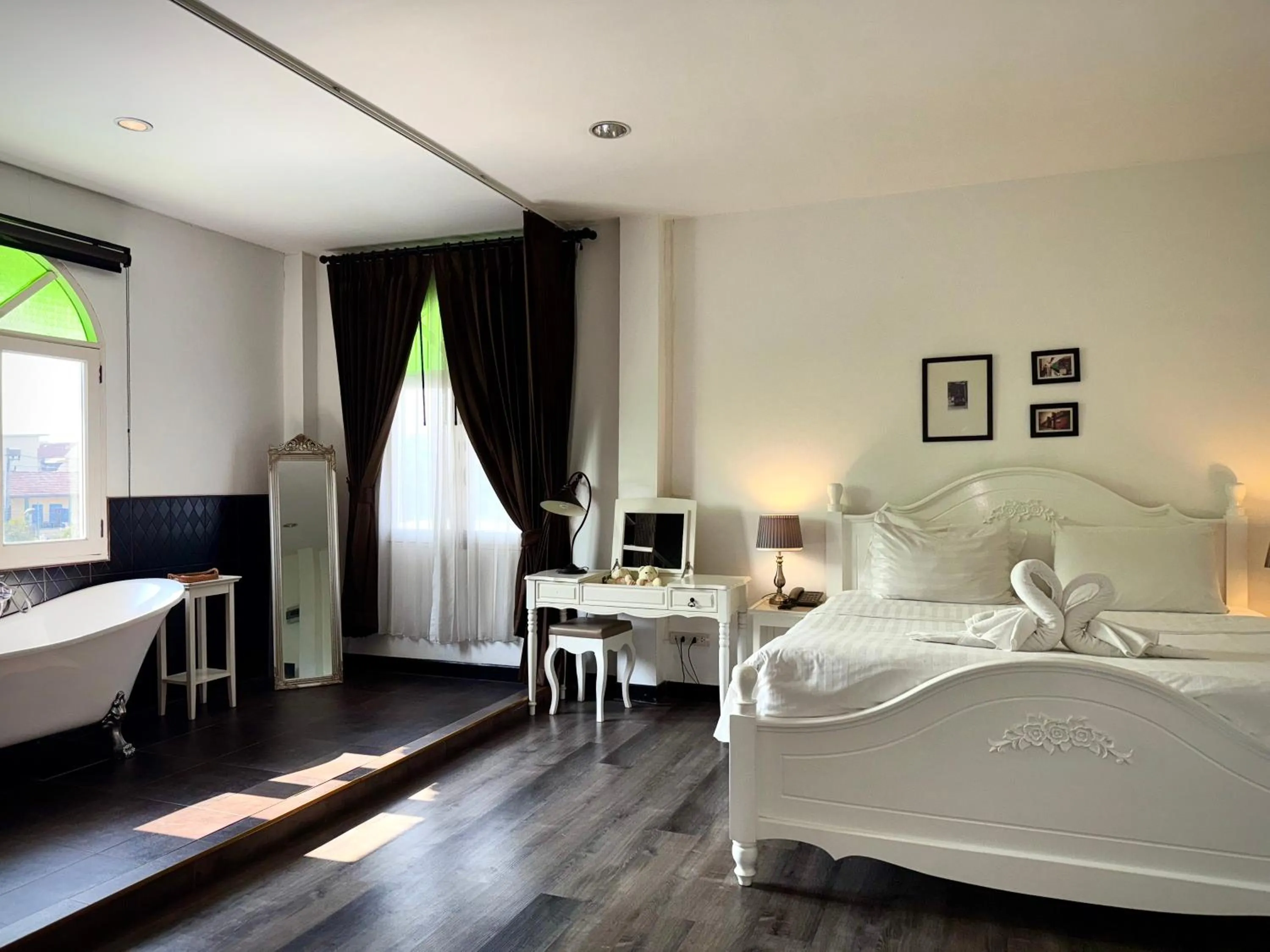 Bed in Nidhra Lanna Hotel Chiang Mai