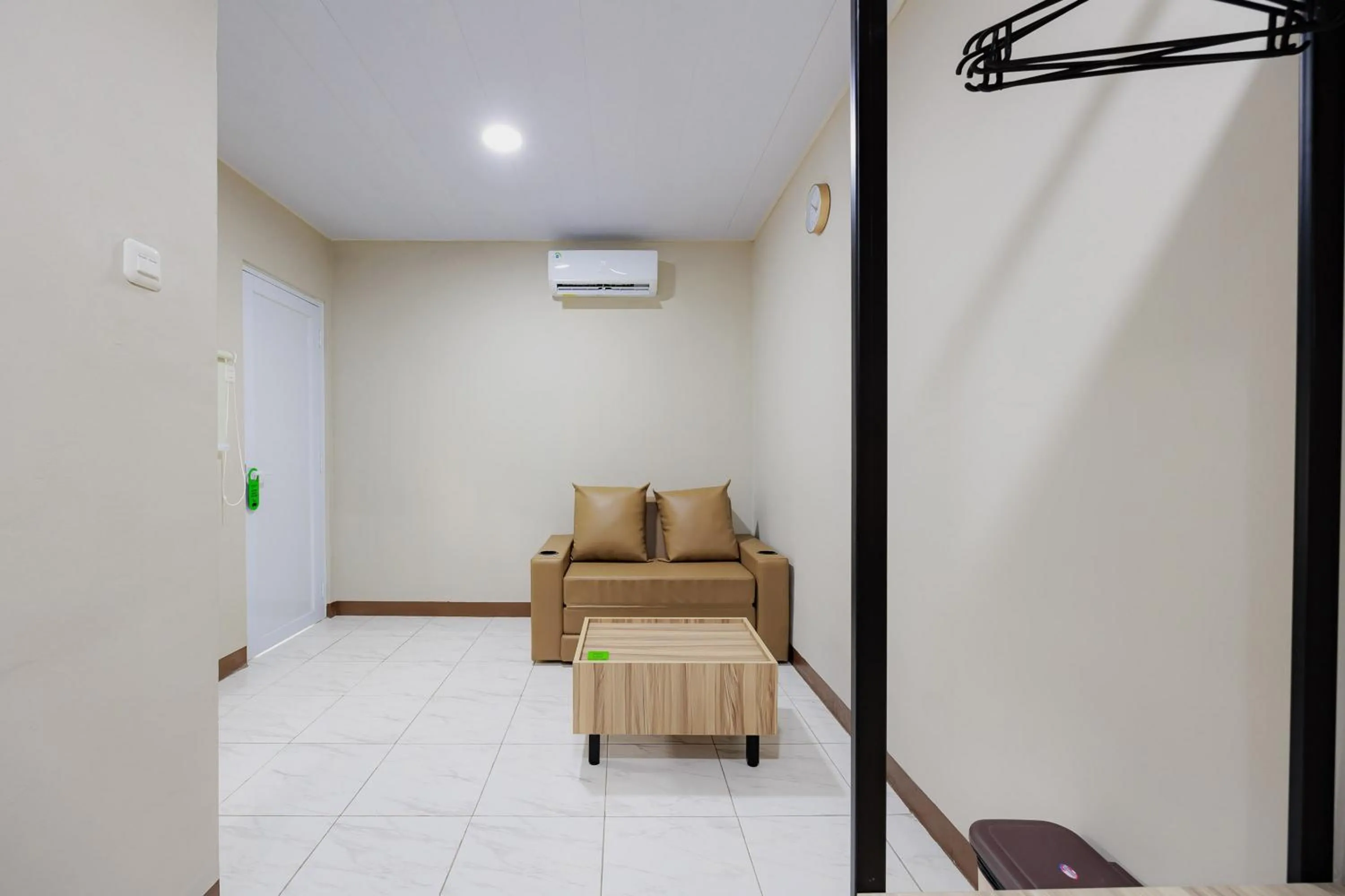 Seating area in Urbanview Petukangan Mansion Jakarta