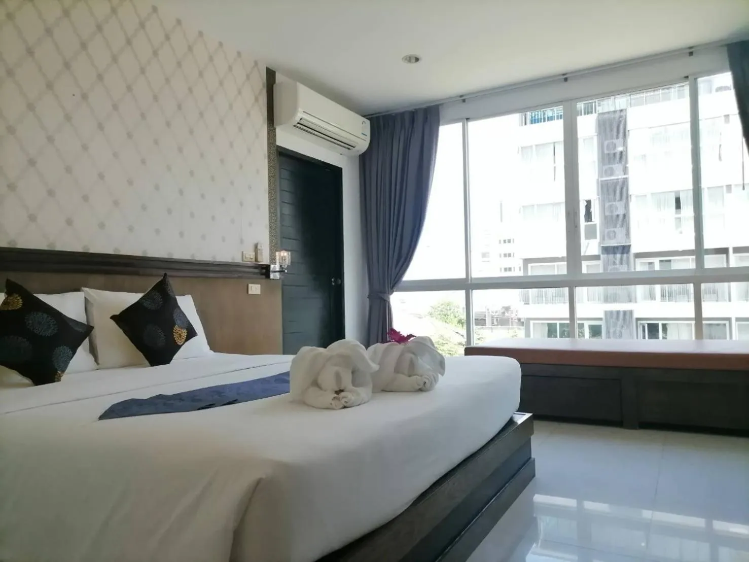 Bed in NJ PATONG HOTEL