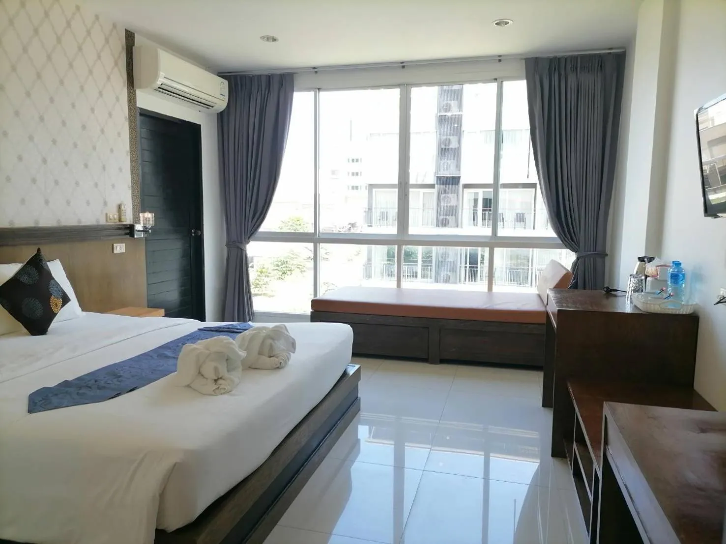 Photo of the whole room, Bed in NJ PATONG HOTEL