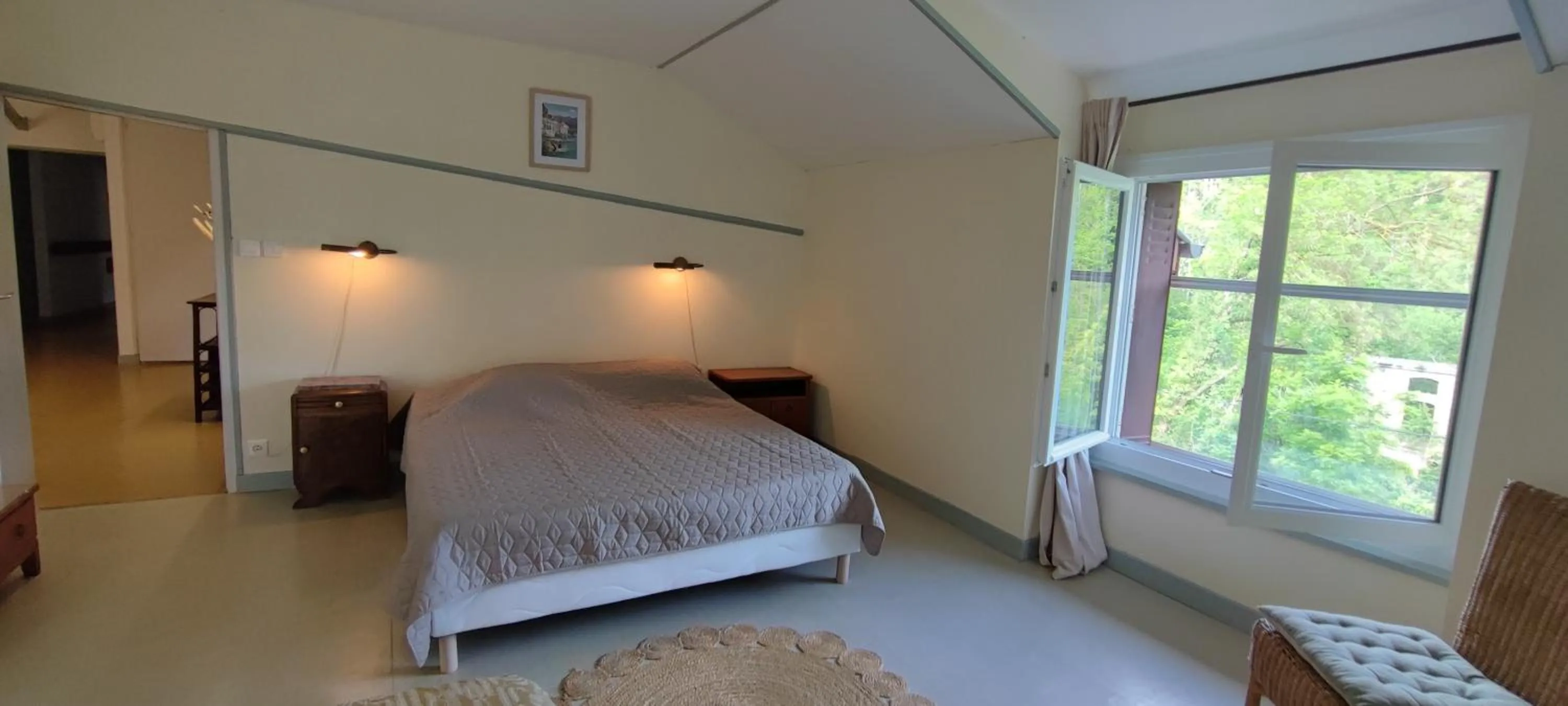 Bed in Les chambres d'hôtes de La Bastide du puech