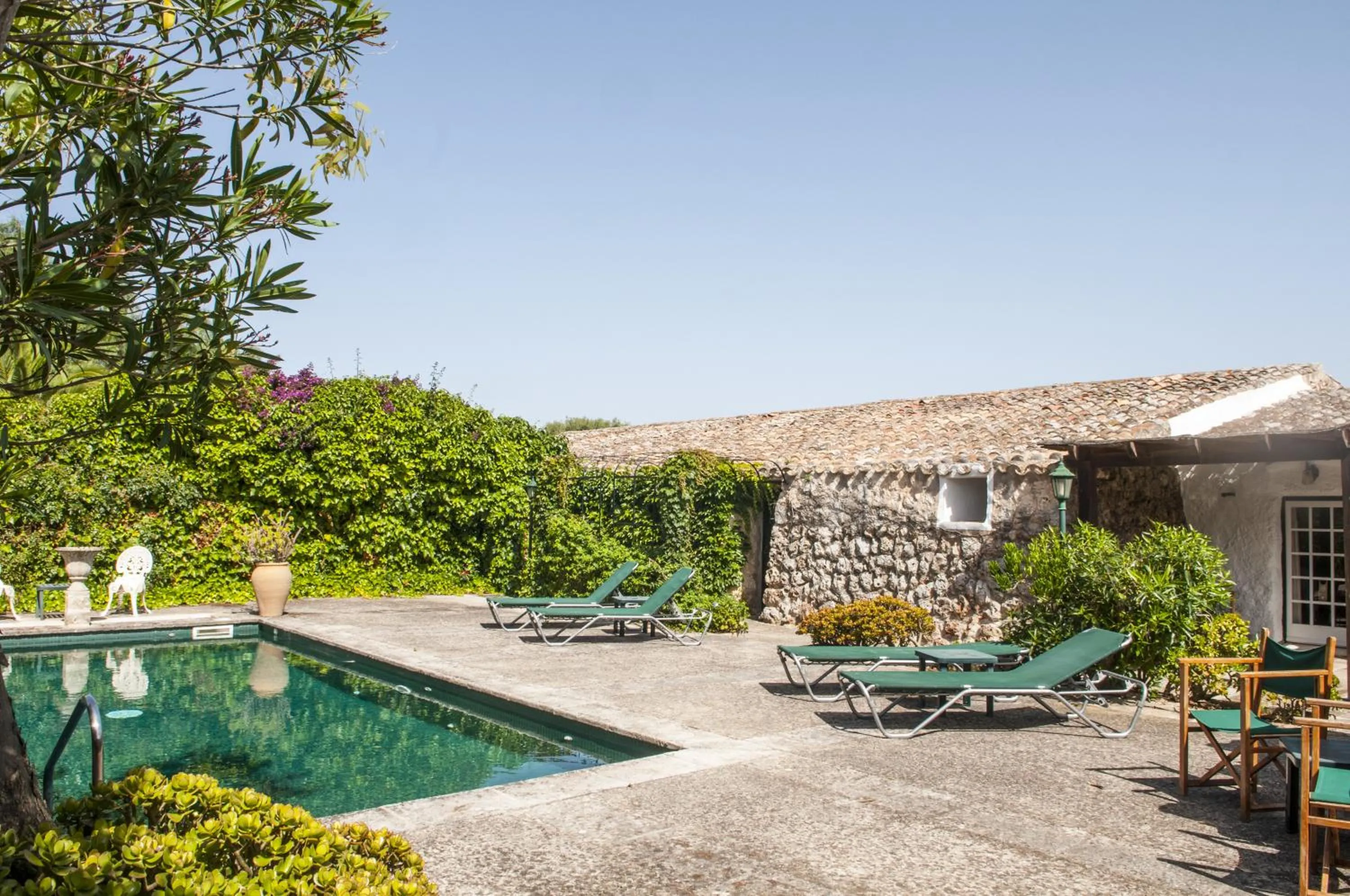 Swimming pool in Hotel Rural Biniarroca - Adults Only