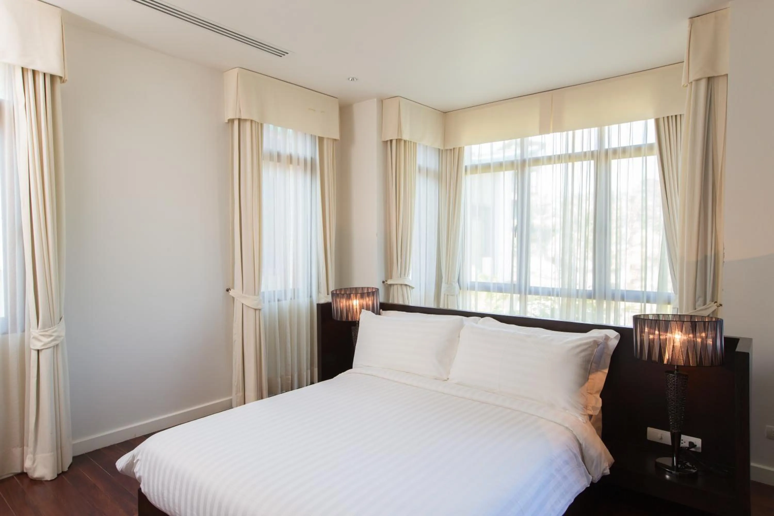 Bedroom, Bed in Amatapura Beachfront Villa 1, SHA Certified