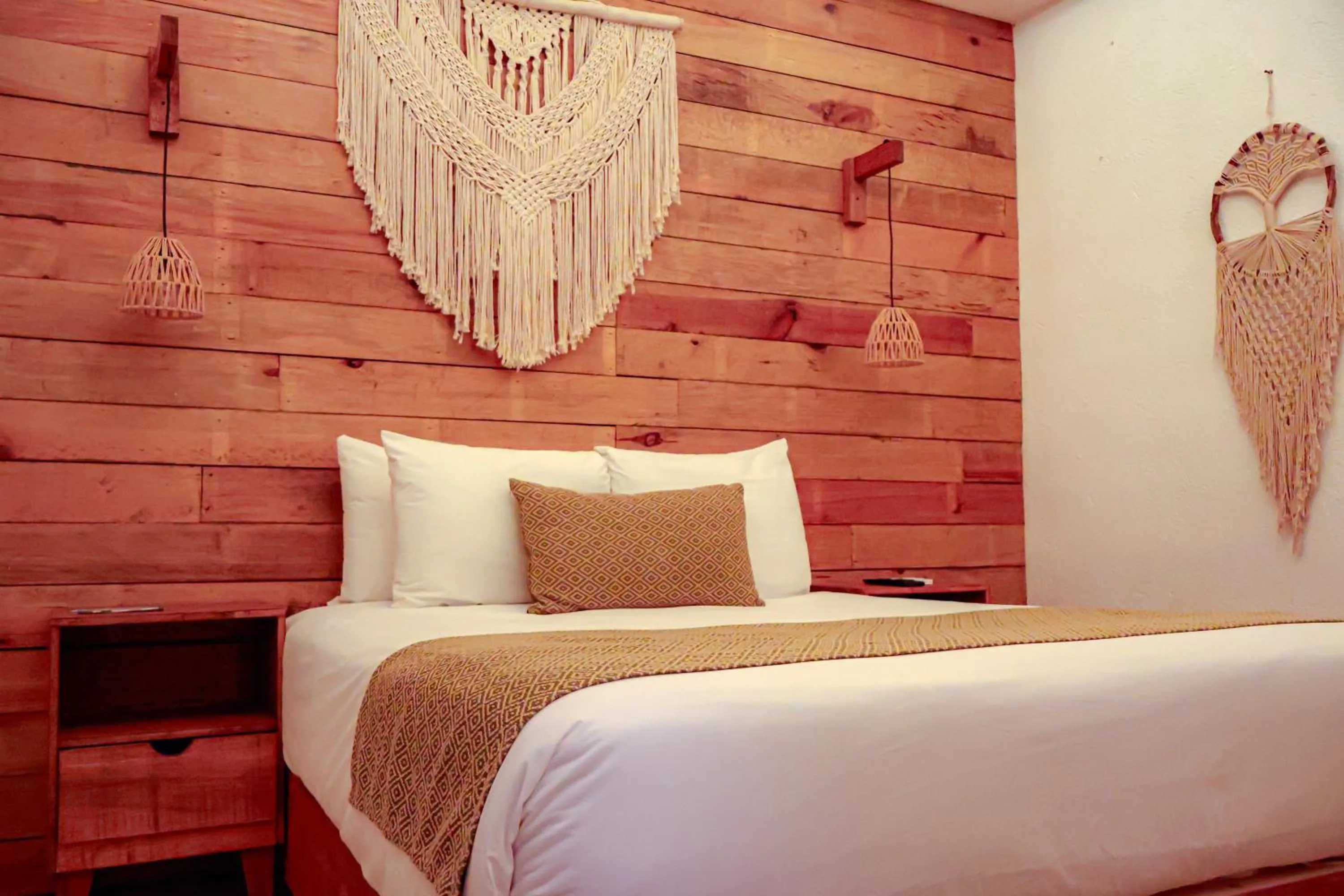 Bed in Enigmatic Hotel Experience