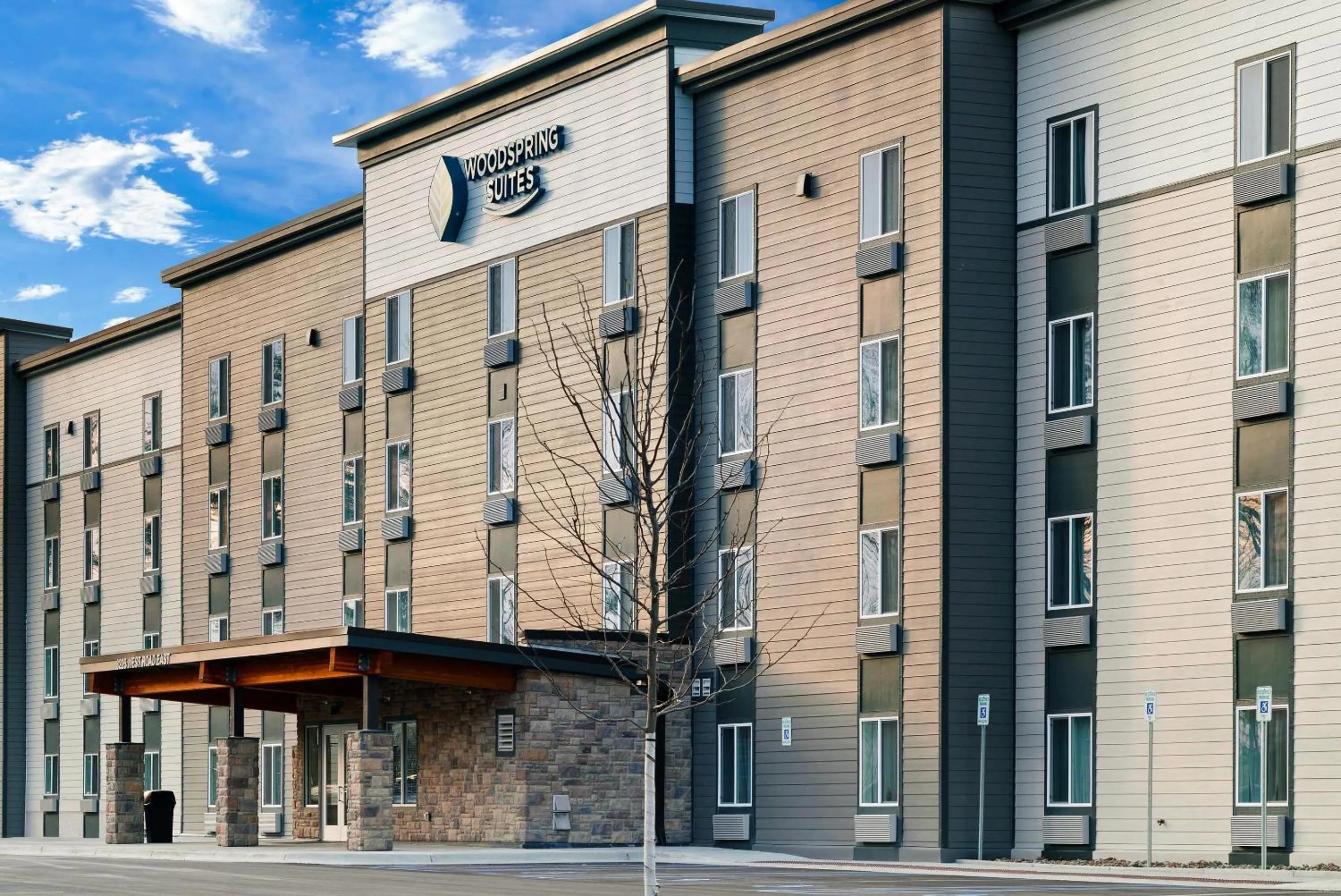 Property building in WoodSpring Suites East Lansing - University Area