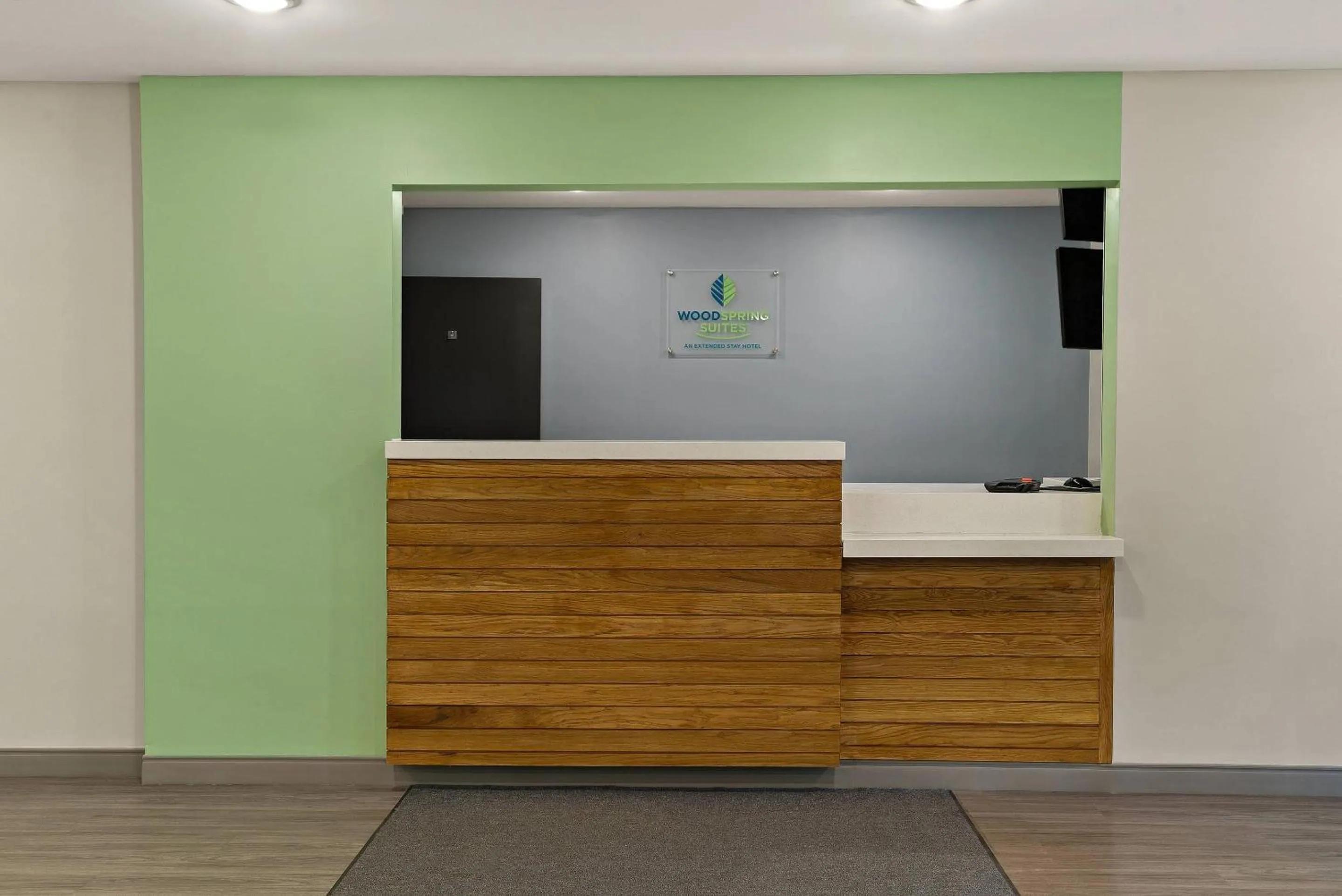 Lobby or reception in WoodSpring Suites East Lansing - University Area