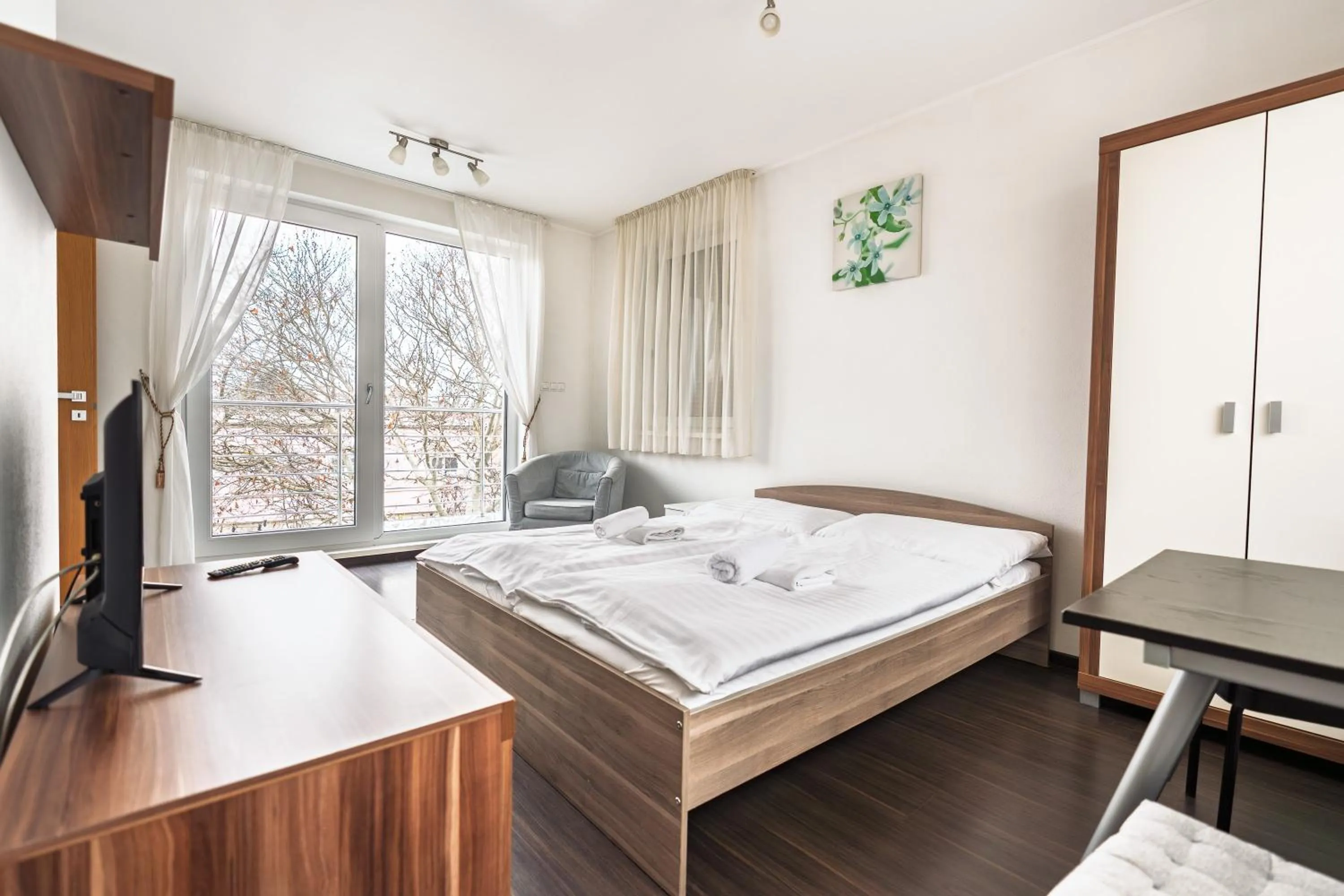 Photo of the whole room, Bed in Fine Restaurant & Apartments