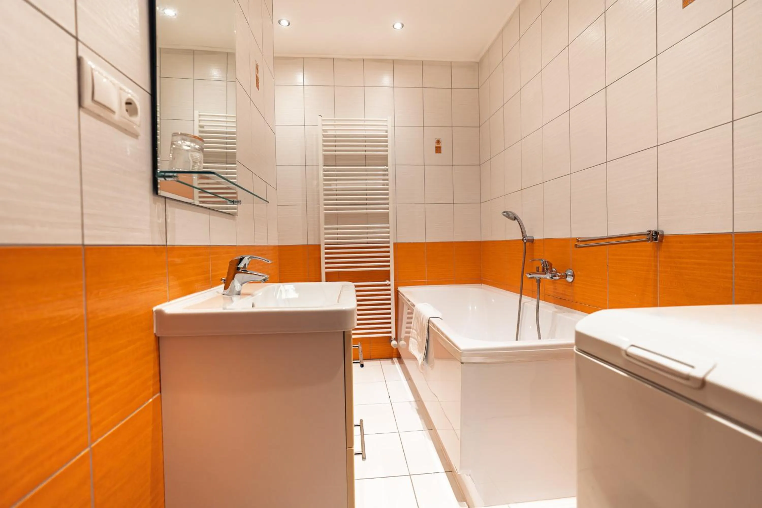 Bathroom in Fine Restaurant & Apartments