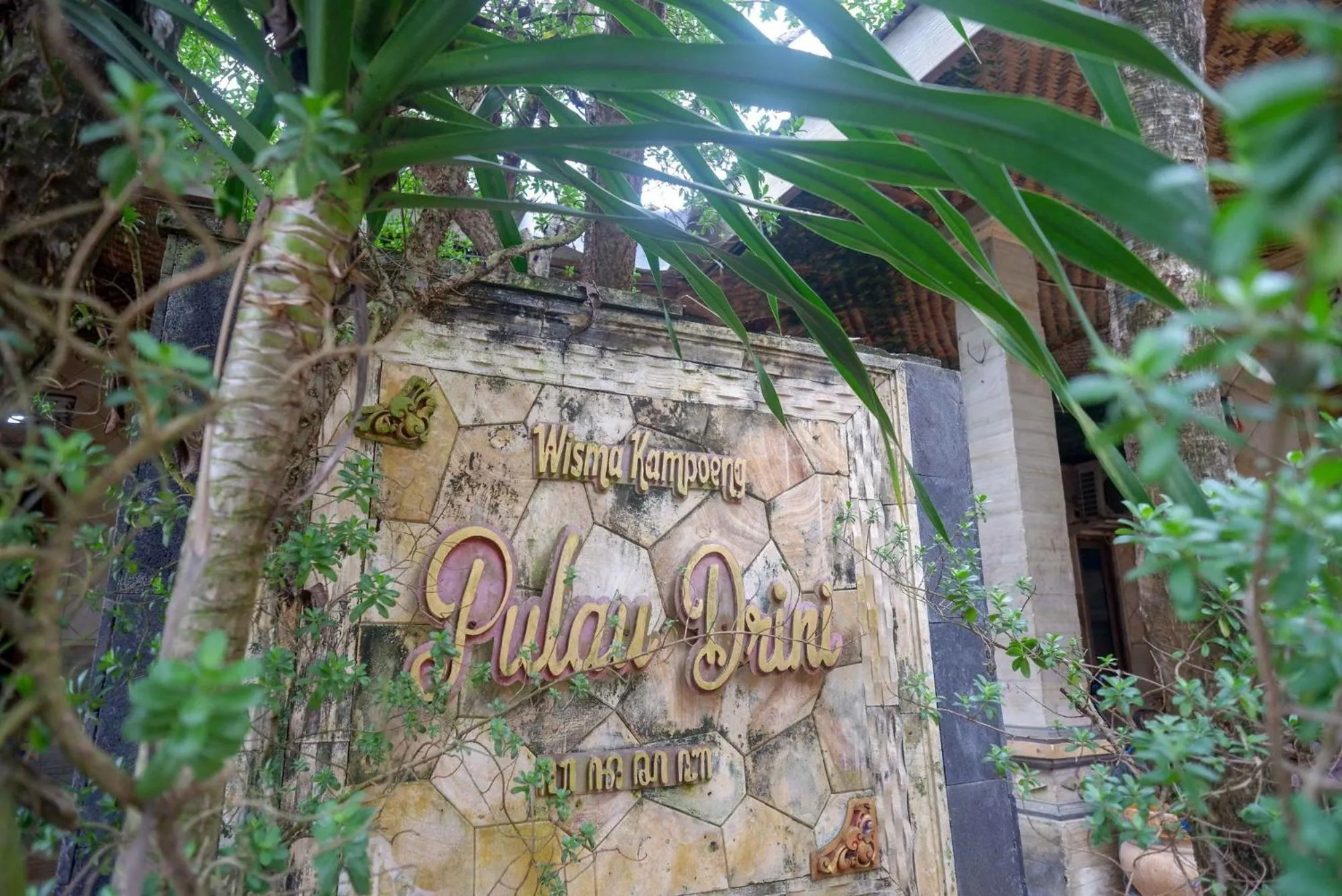 Property logo or sign in Hotel Kampoeng Drini RedPartner