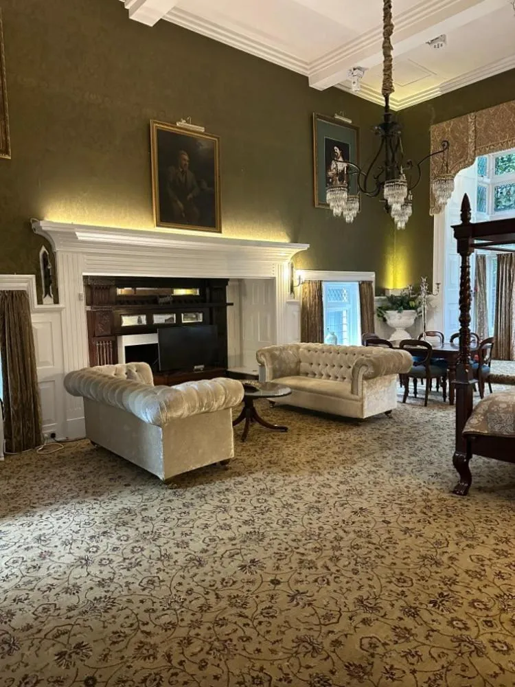 Bedroom in Langtry Manor Hotel