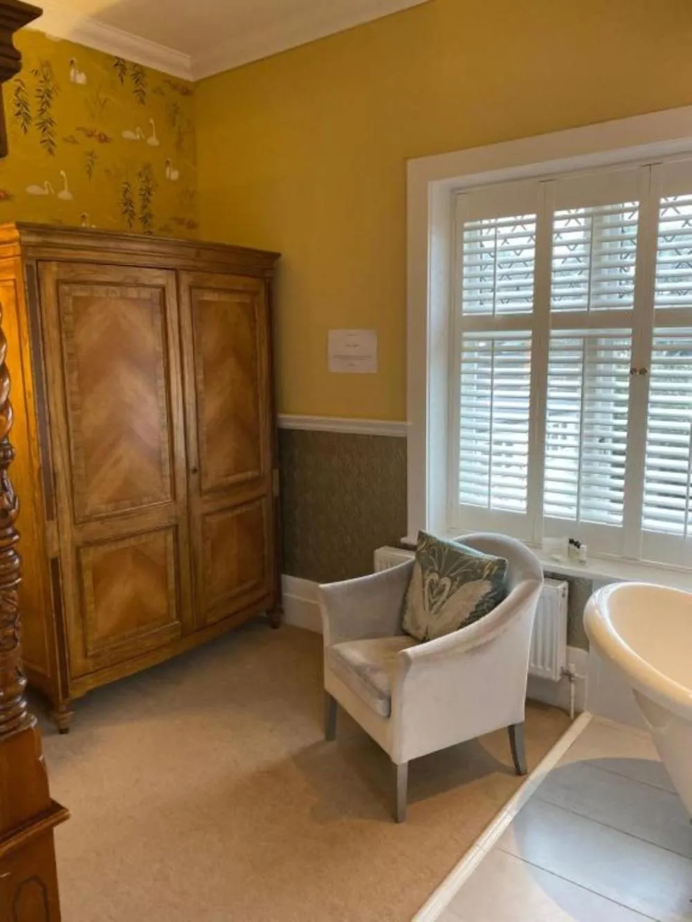 Bedroom in Langtry Manor Hotel