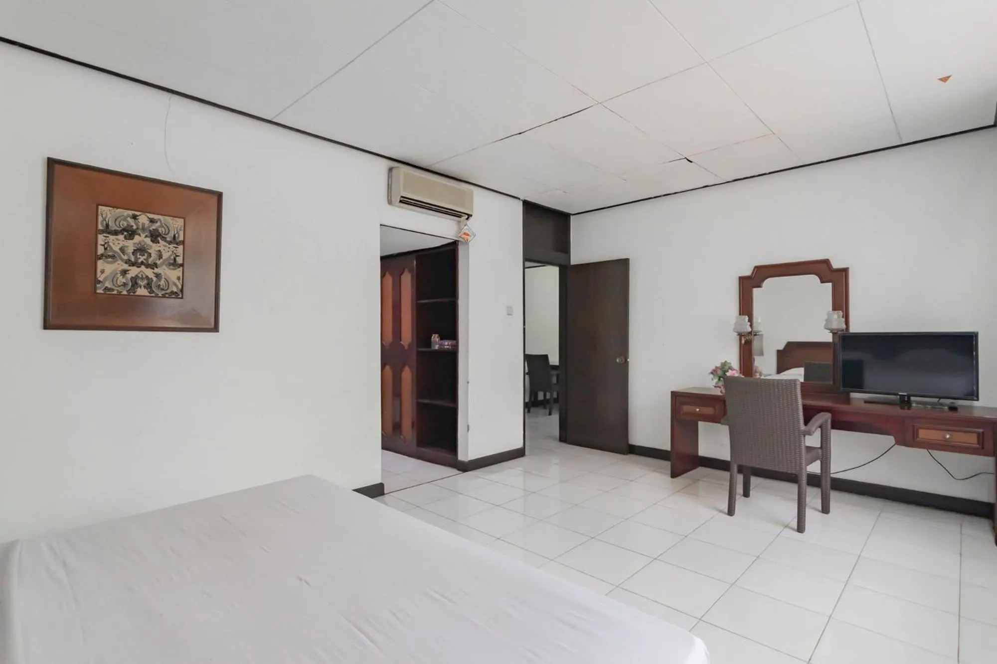 Bed in Istana Hotel Bandung Mitra RedDoorz