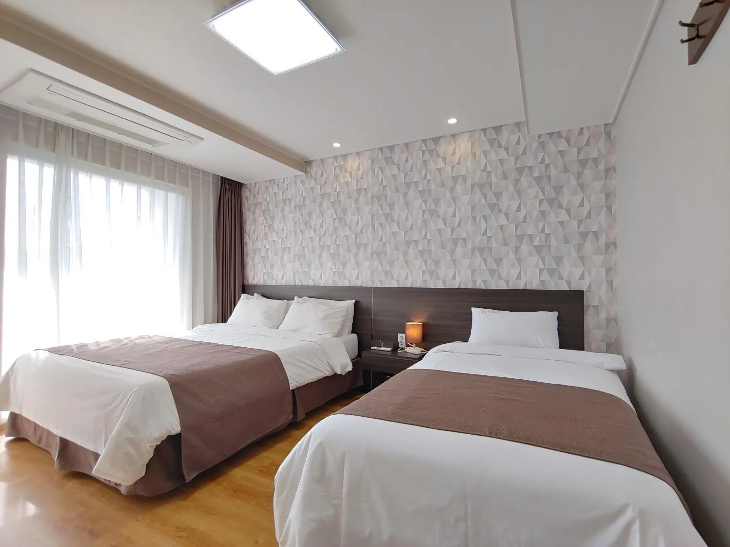 Bed in Jeju Lavender Hotel