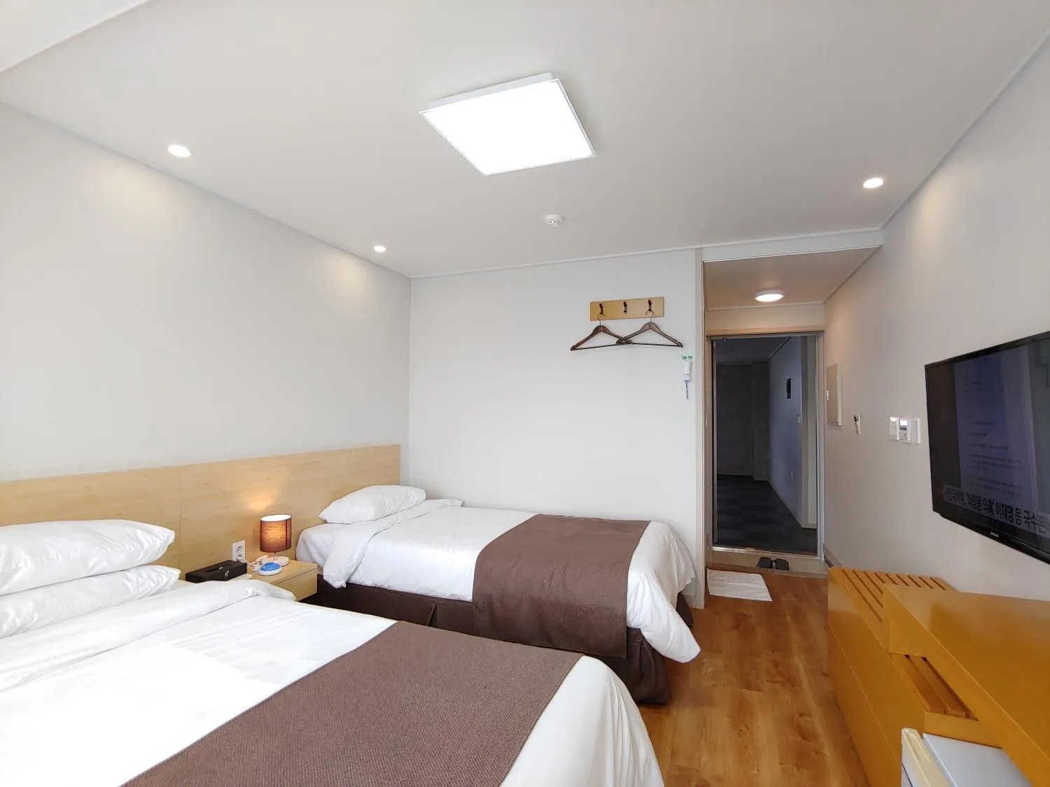 Bed in Jeju Lavender Hotel