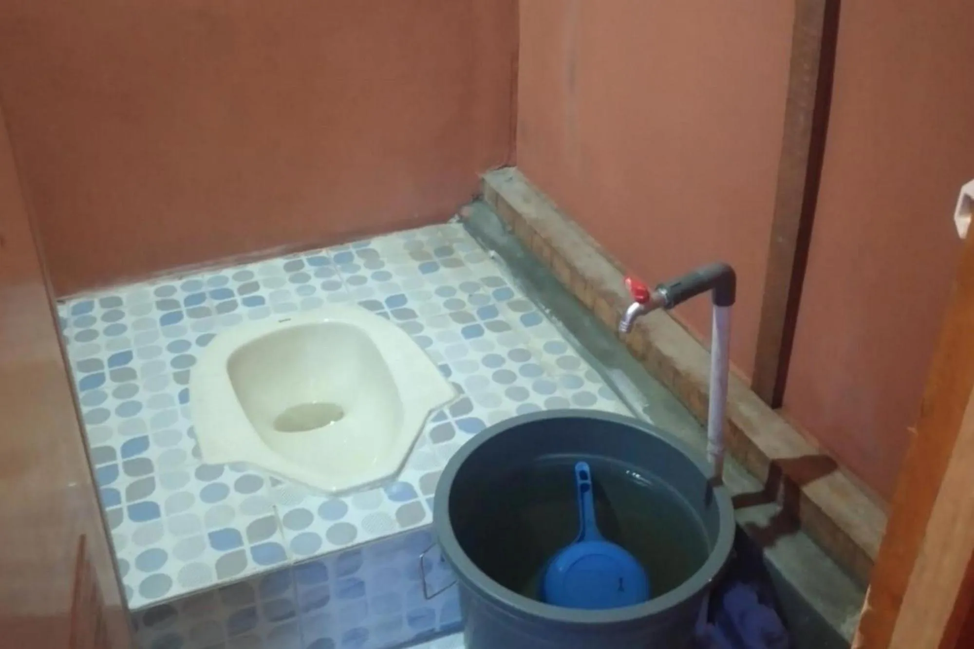 Toilet, Bed in Penginapan puncak Dua Mitra RedDoorz