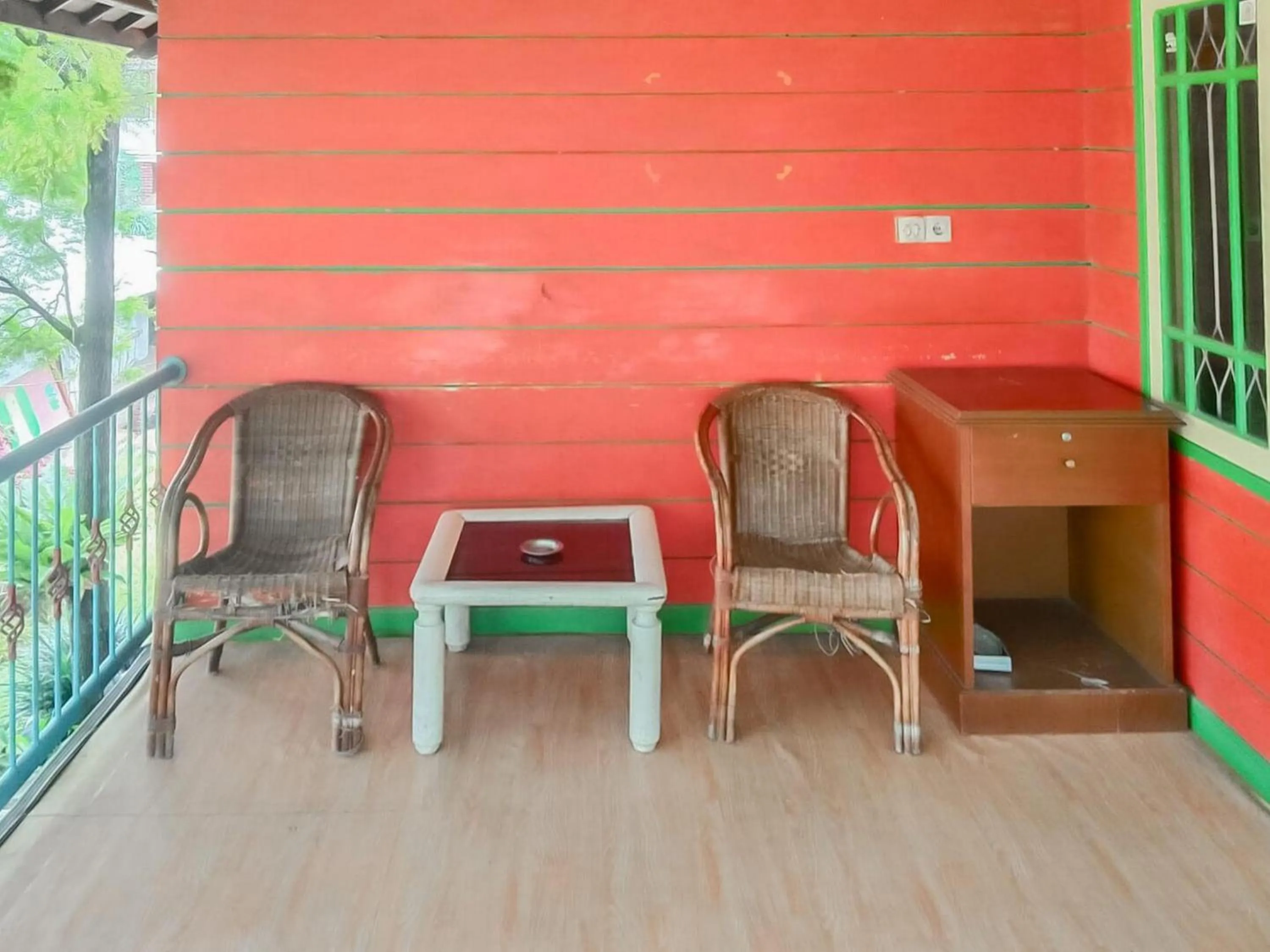 Seating area in Villa Anyelir Yustik Mitra RedDoorz