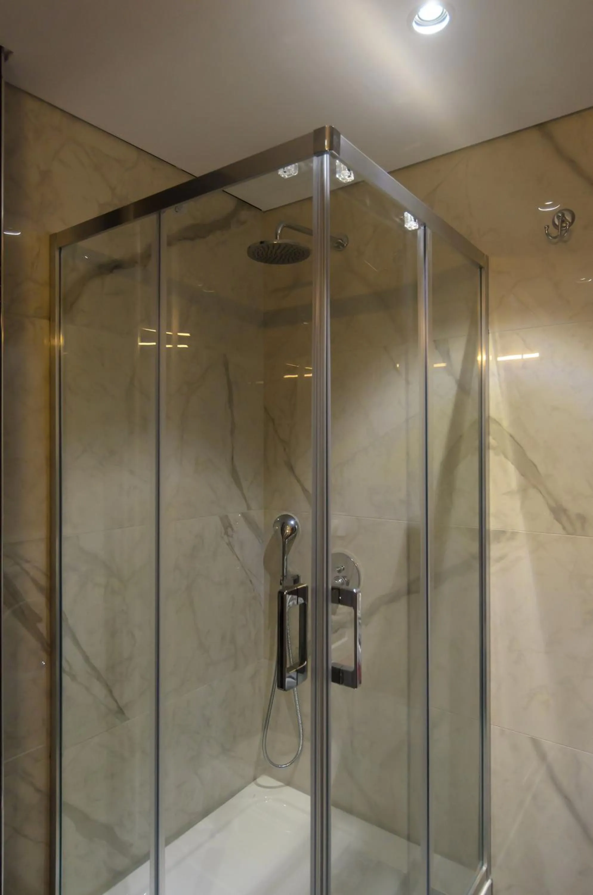 Shower in Beachfront Batumi View Apartments by GLOBALSTAY