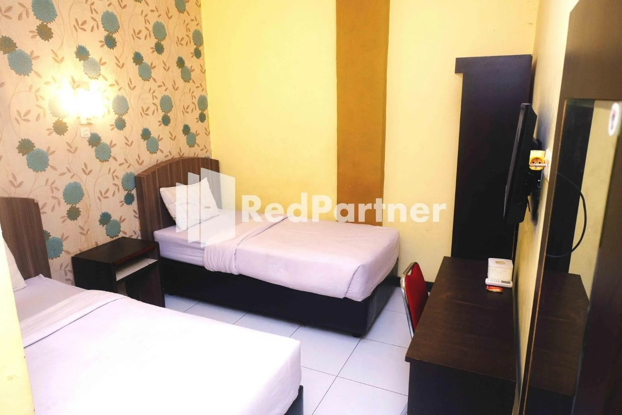 Bed in Hotel Permata Makassar Mitra RedDoorz