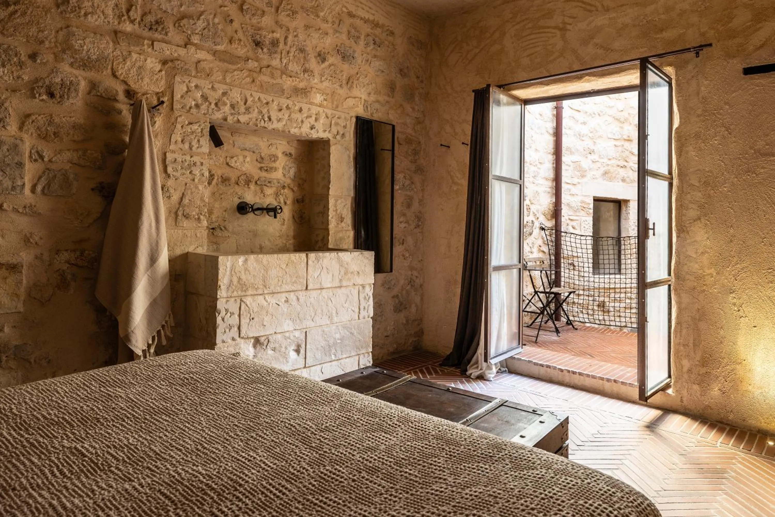 Bed in Amalen Suites Adults Only