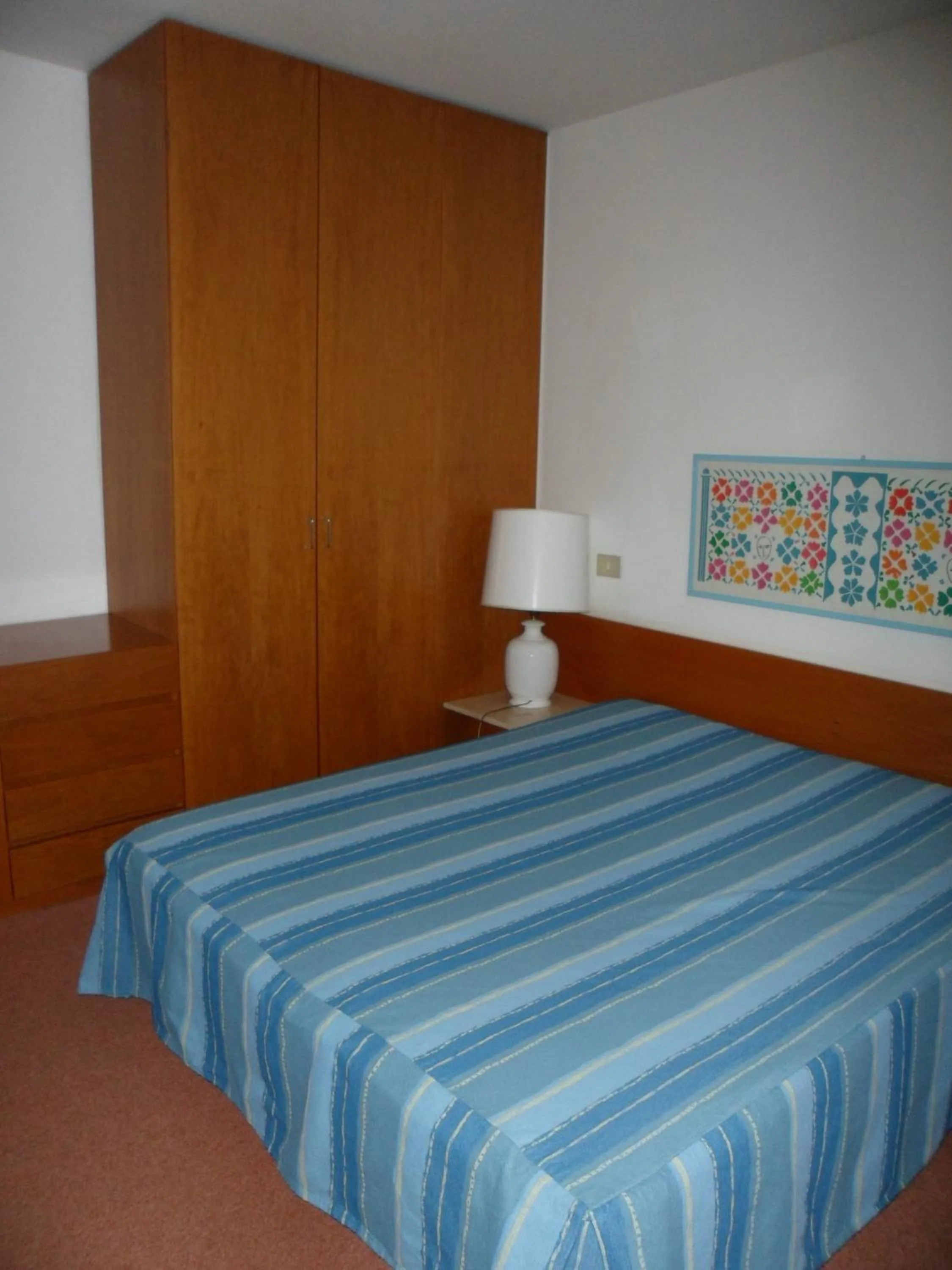 Bedroom in Appartamento 109 - Multiproprietà I Boboli BC