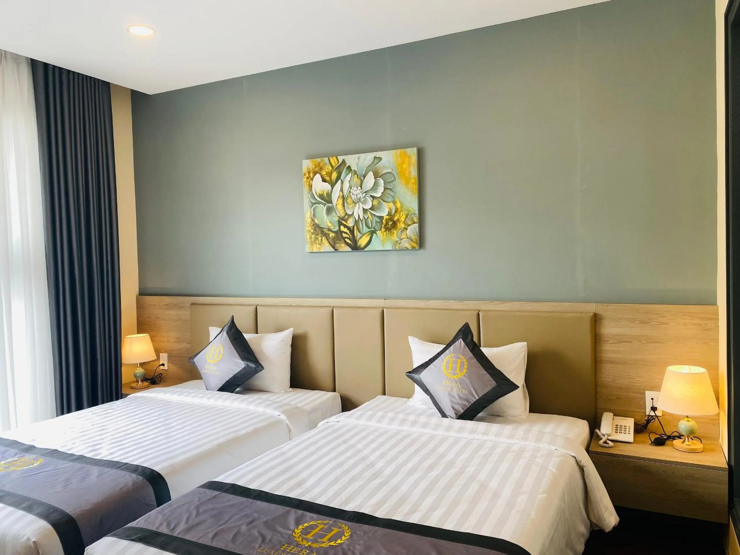 Bed in Hera Luxury Hotel