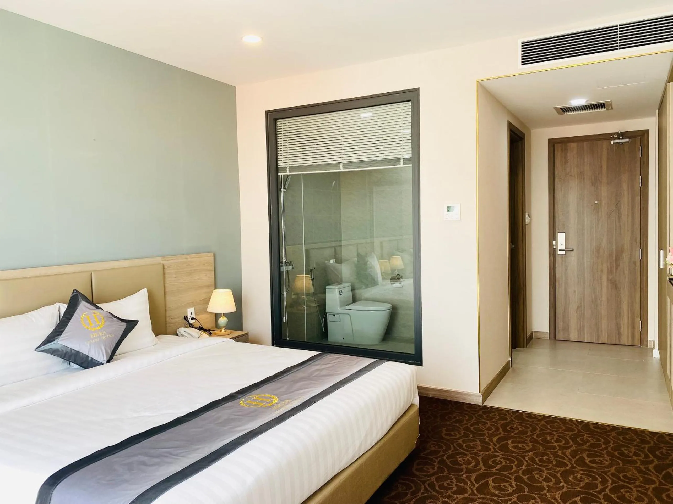 Bed in Hera Luxury Hotel