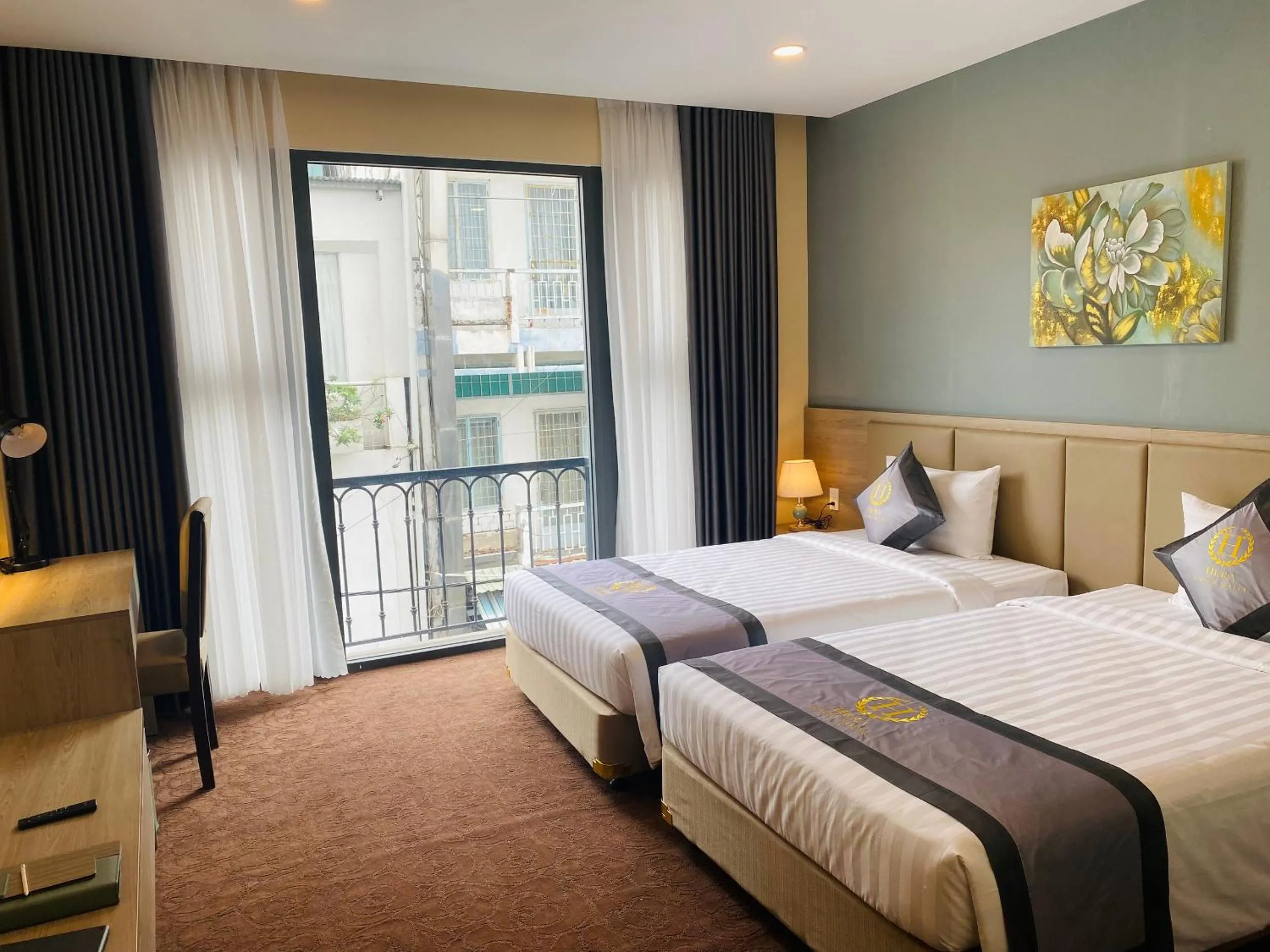 Bed in Hera Luxury Hotel