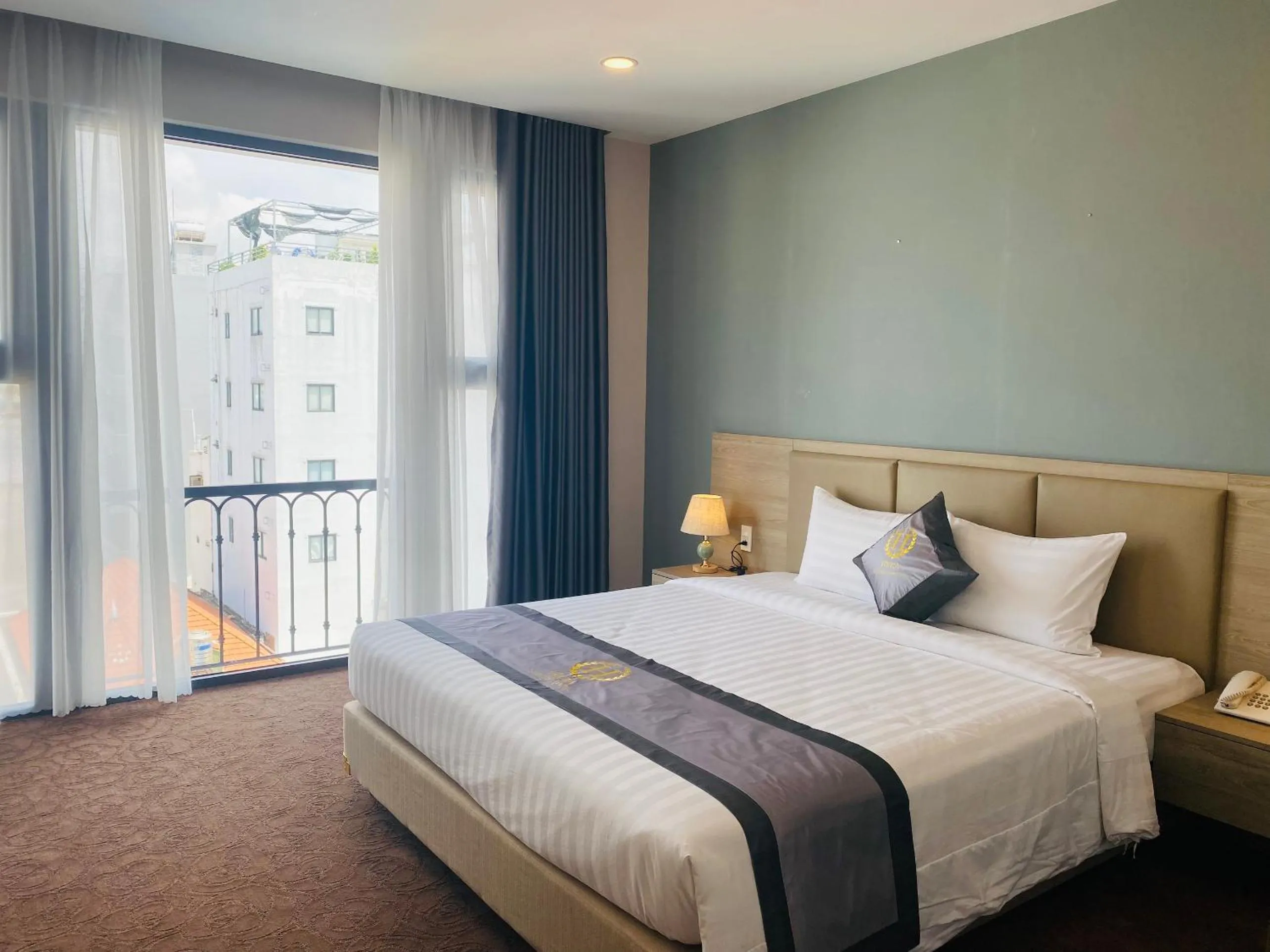 Bed in Hera Luxury Hotel