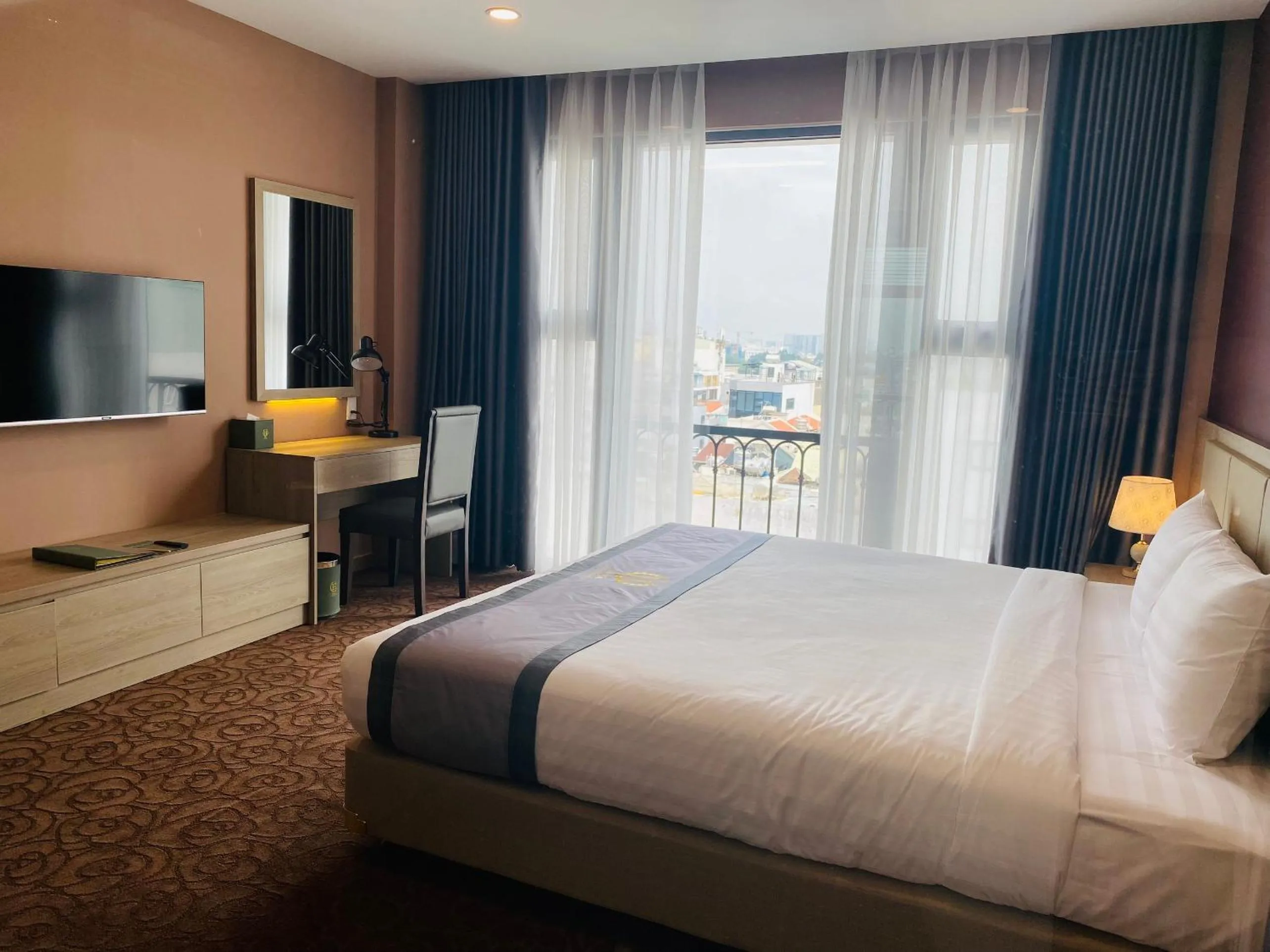 Bed in Hera Luxury Hotel