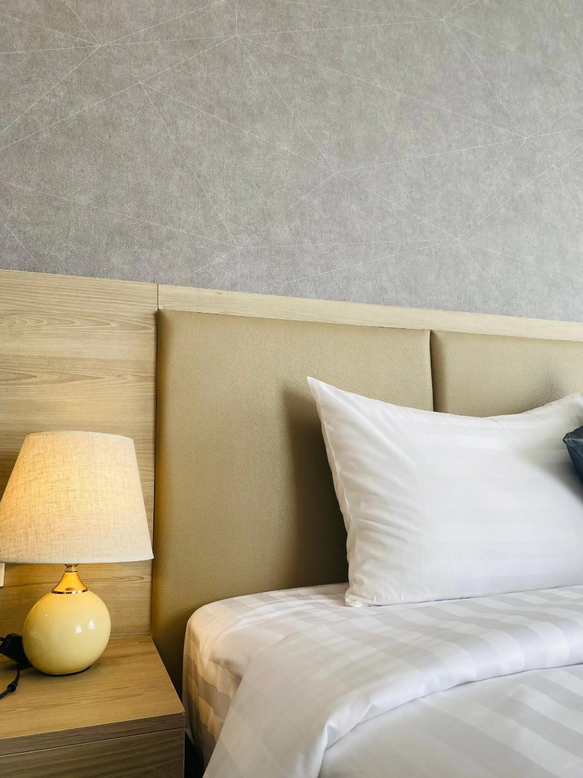 Bed in Hera Luxury Hotel