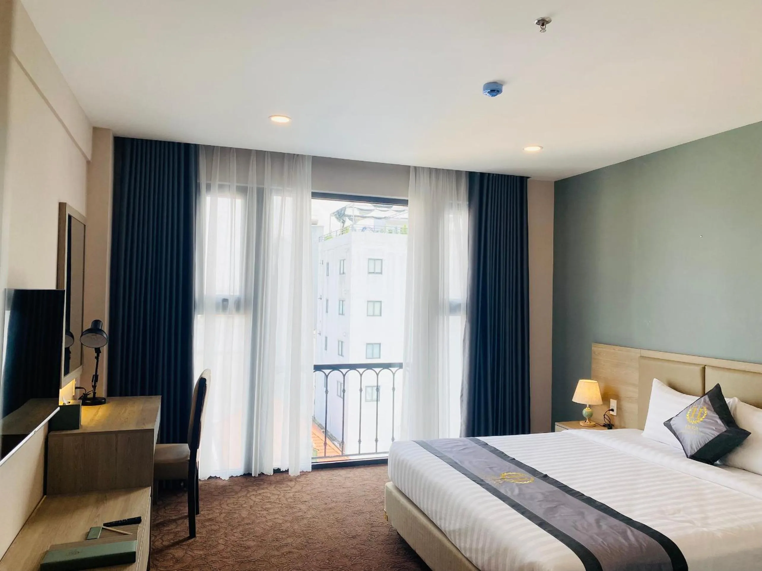 Bed in Hera Luxury Hotel