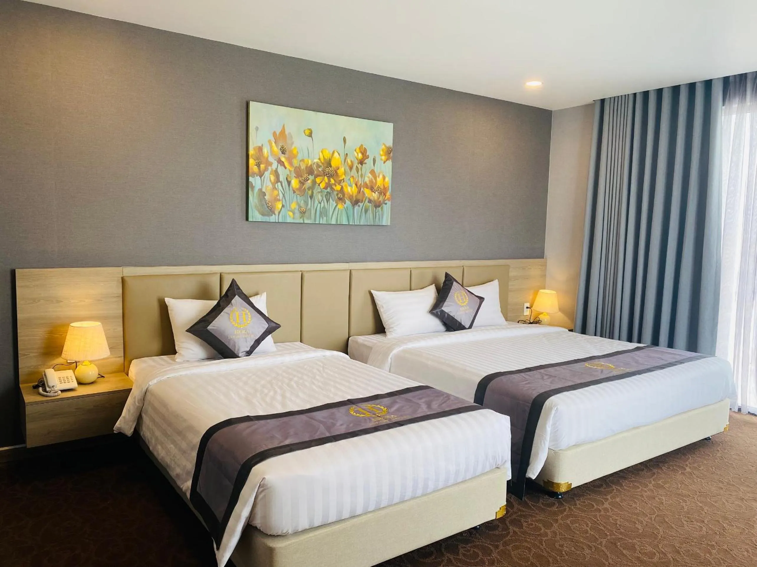 Bed in Hera Luxury Hotel