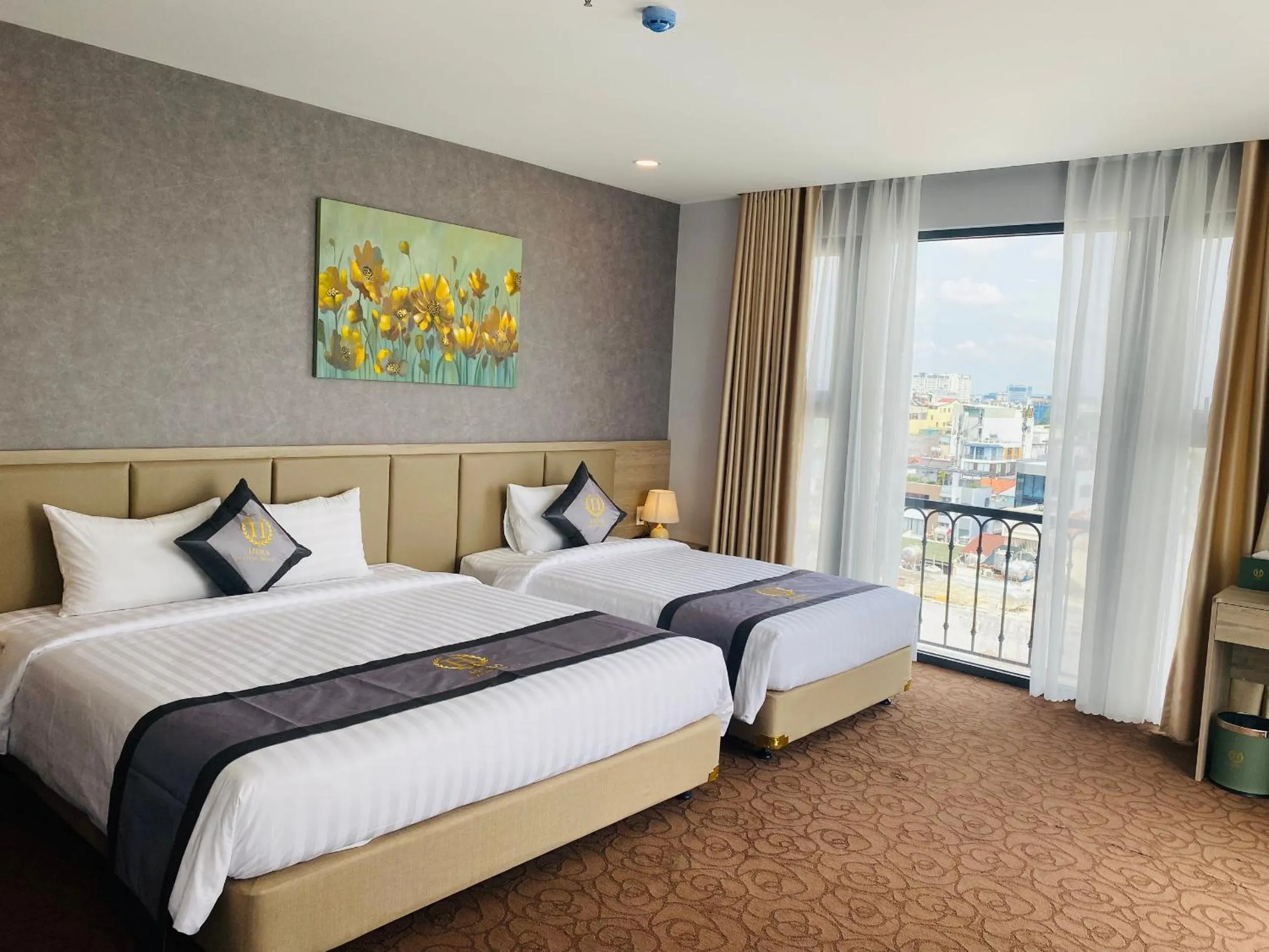 Bed in Hera Luxury Hotel