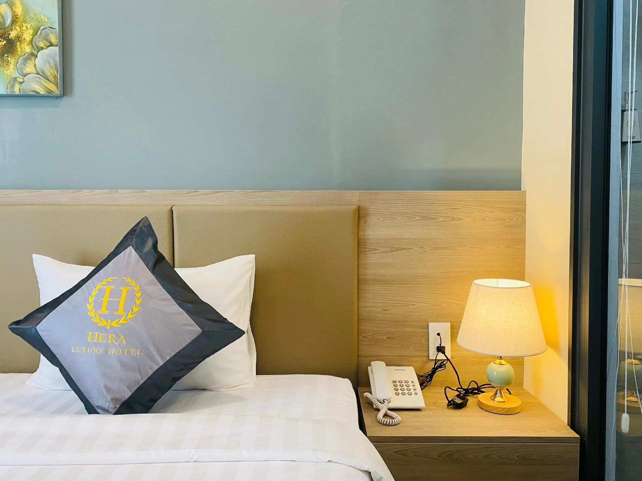 Bed in Hera Luxury Hotel