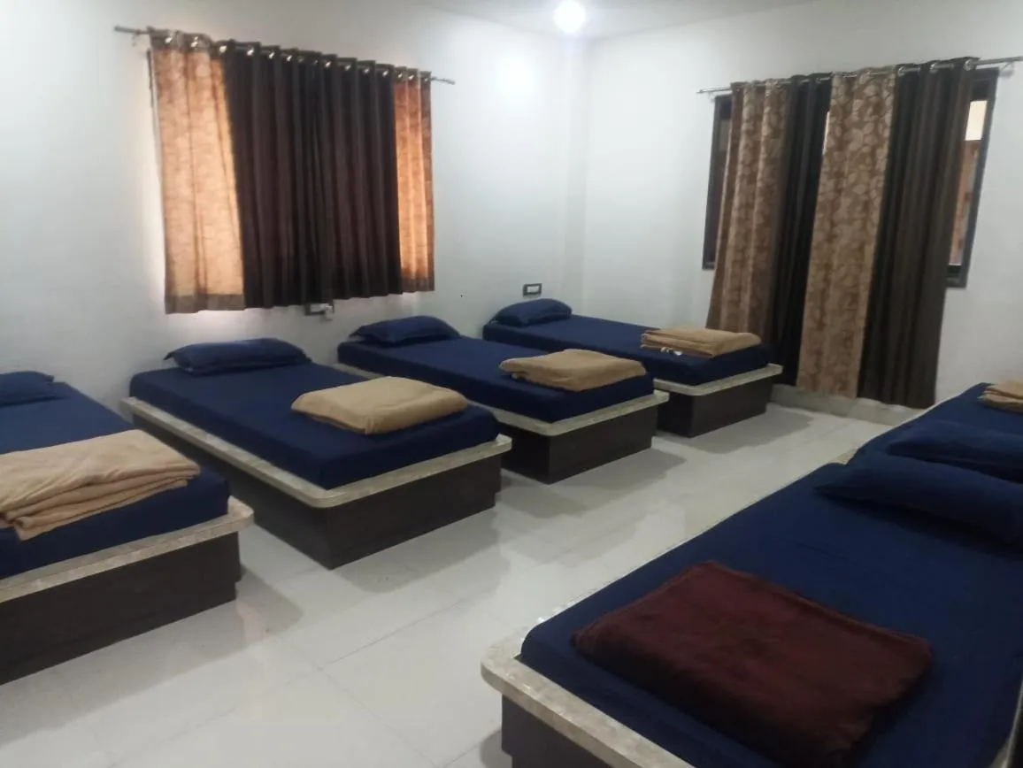 Bed in Hotel Bafna Lawn