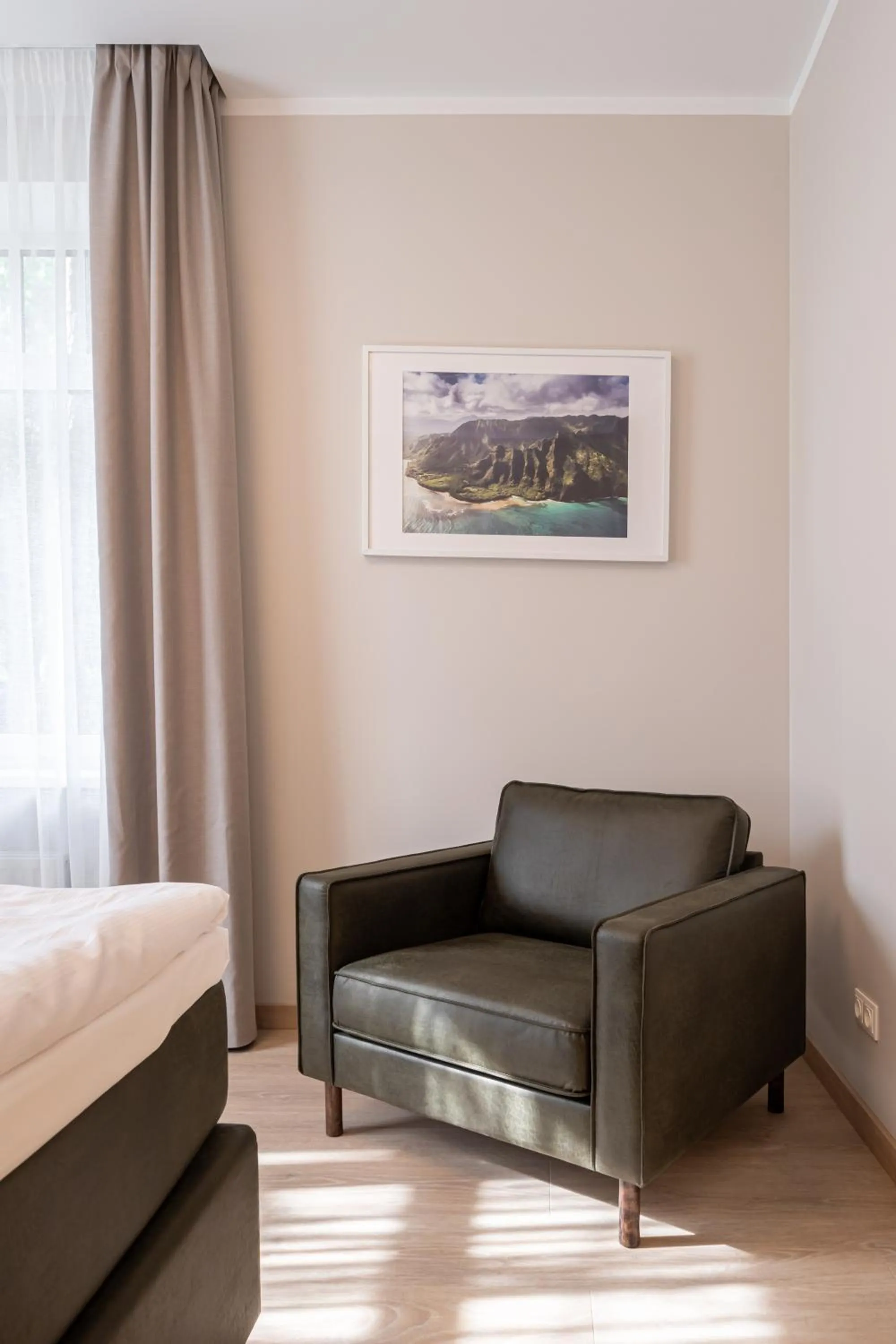 Bed in STORIES Design ApartHotel