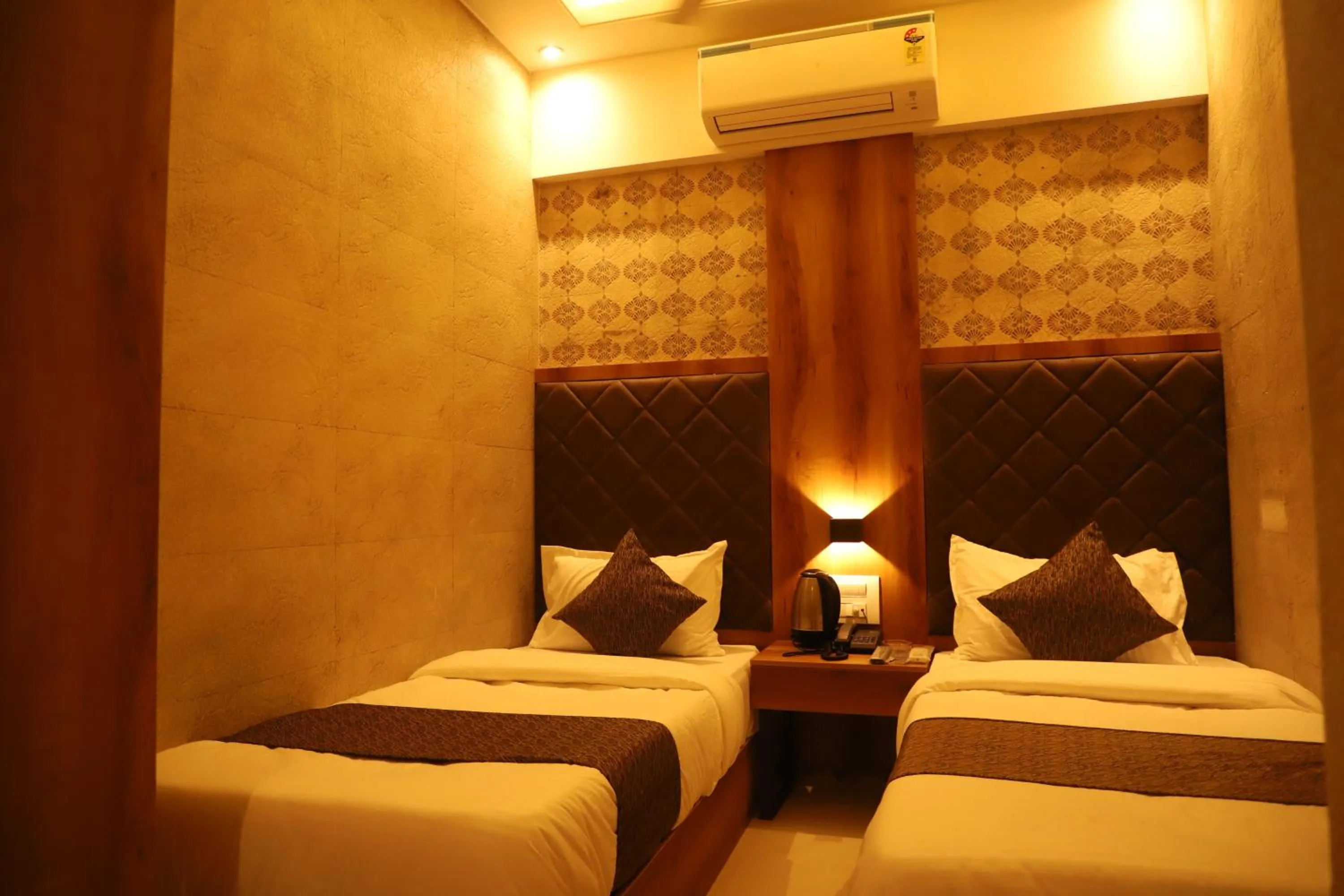 Bed in Hotel Sai Pritam