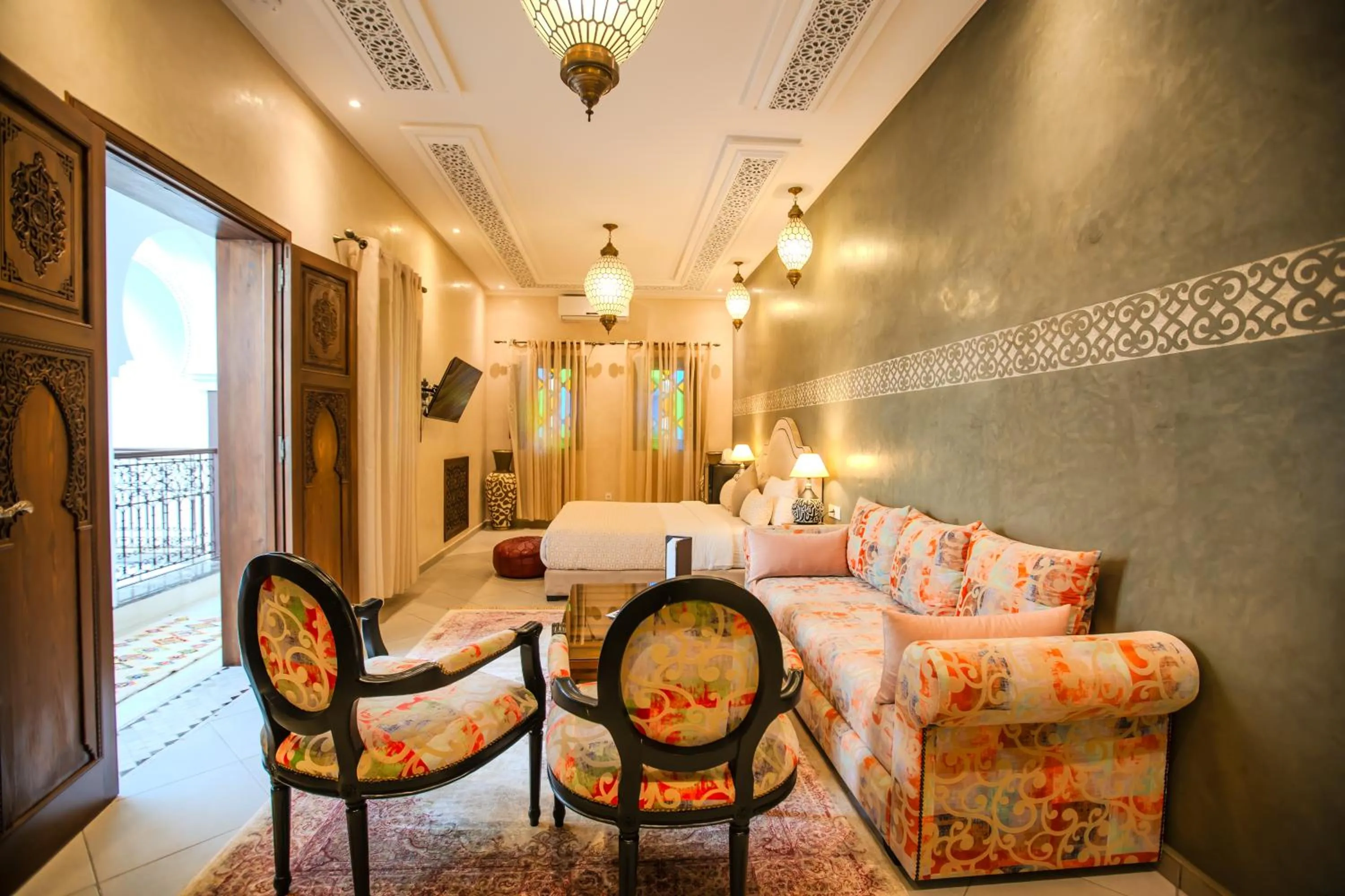 Living room, Bed in Riad Mandana & Spa