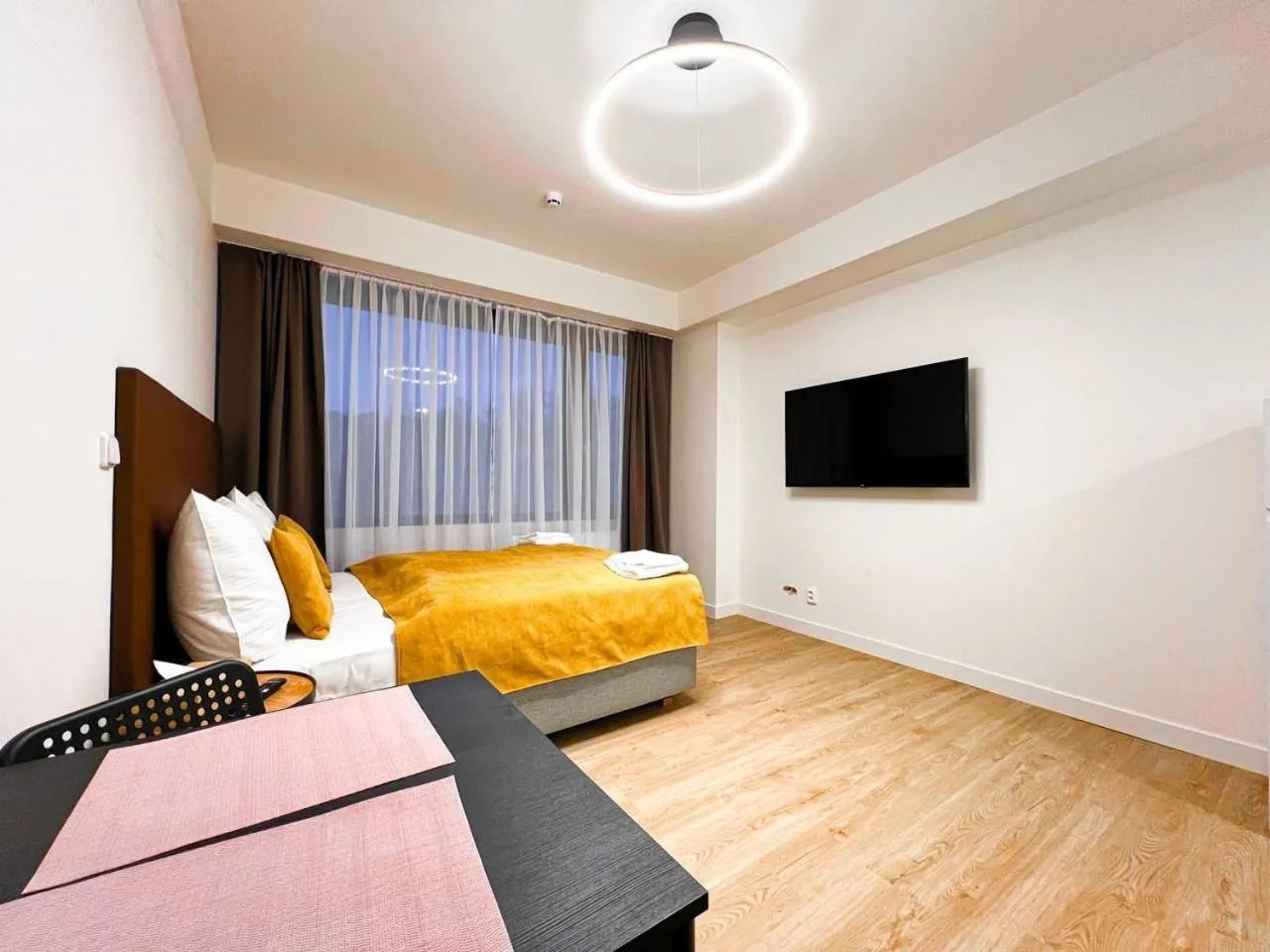 Communal lounge/ TV room, Bed in Post 120 Suites